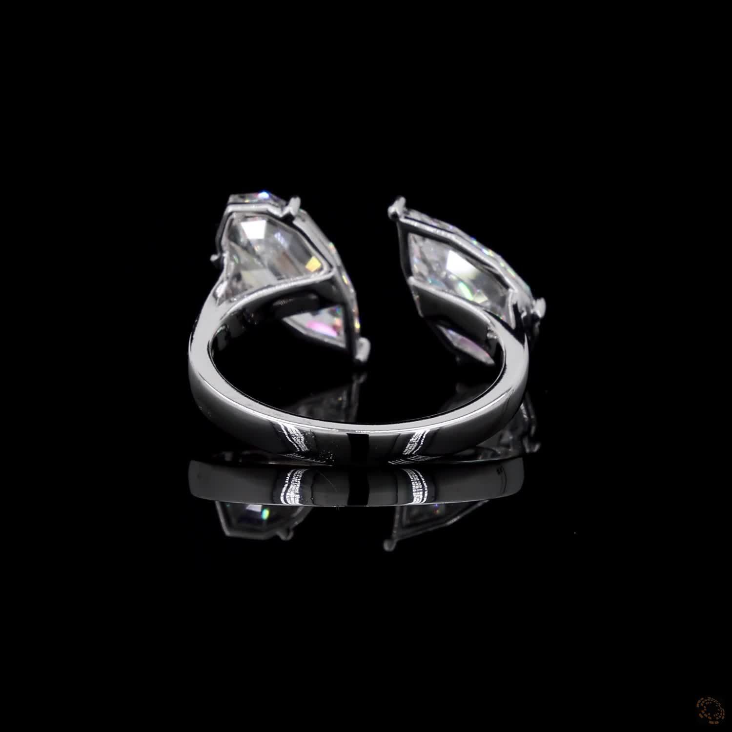 4.38 Ct Open cuff band with individually set basket prongs and protective V-prongs on the tips