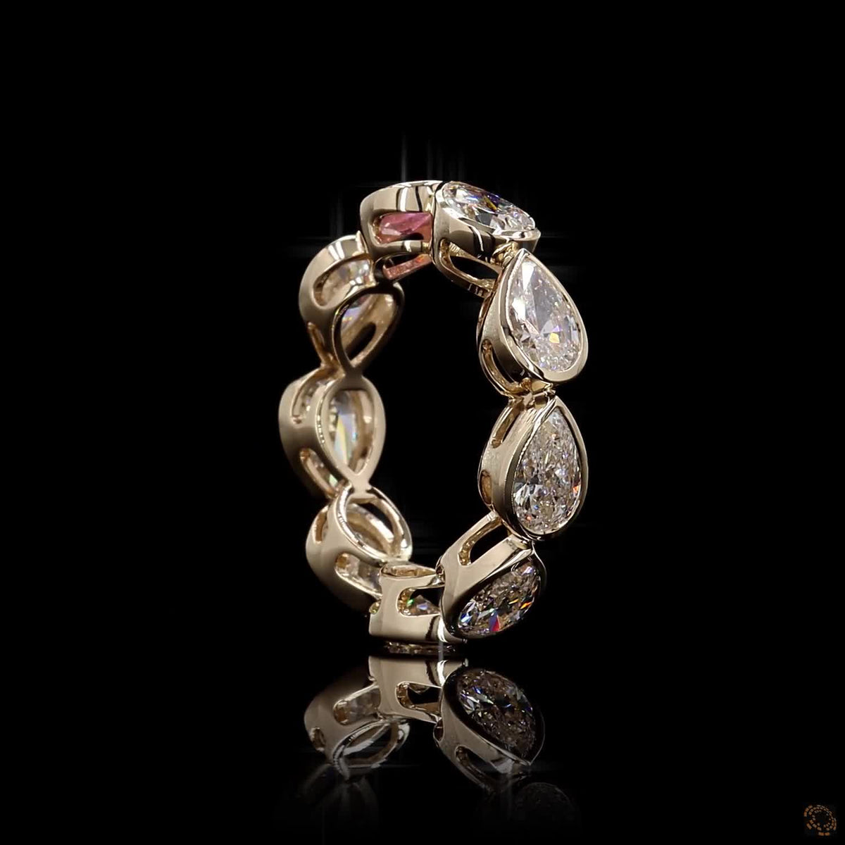 2.47 Ct East-West Bezel-Set Pear Diamond Eternity Band with Pink Sapphire Accent in Yellow Gold