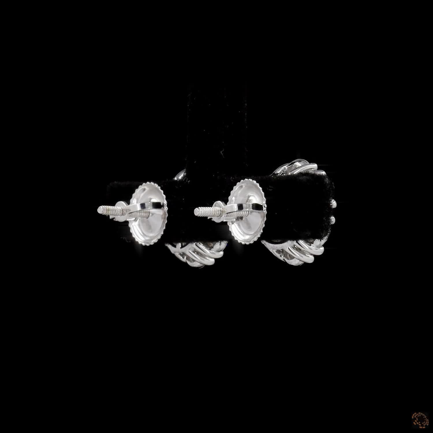 2.2 Ct Round Brilliant Cut Central diamond framed by a floral halo of round diamonds