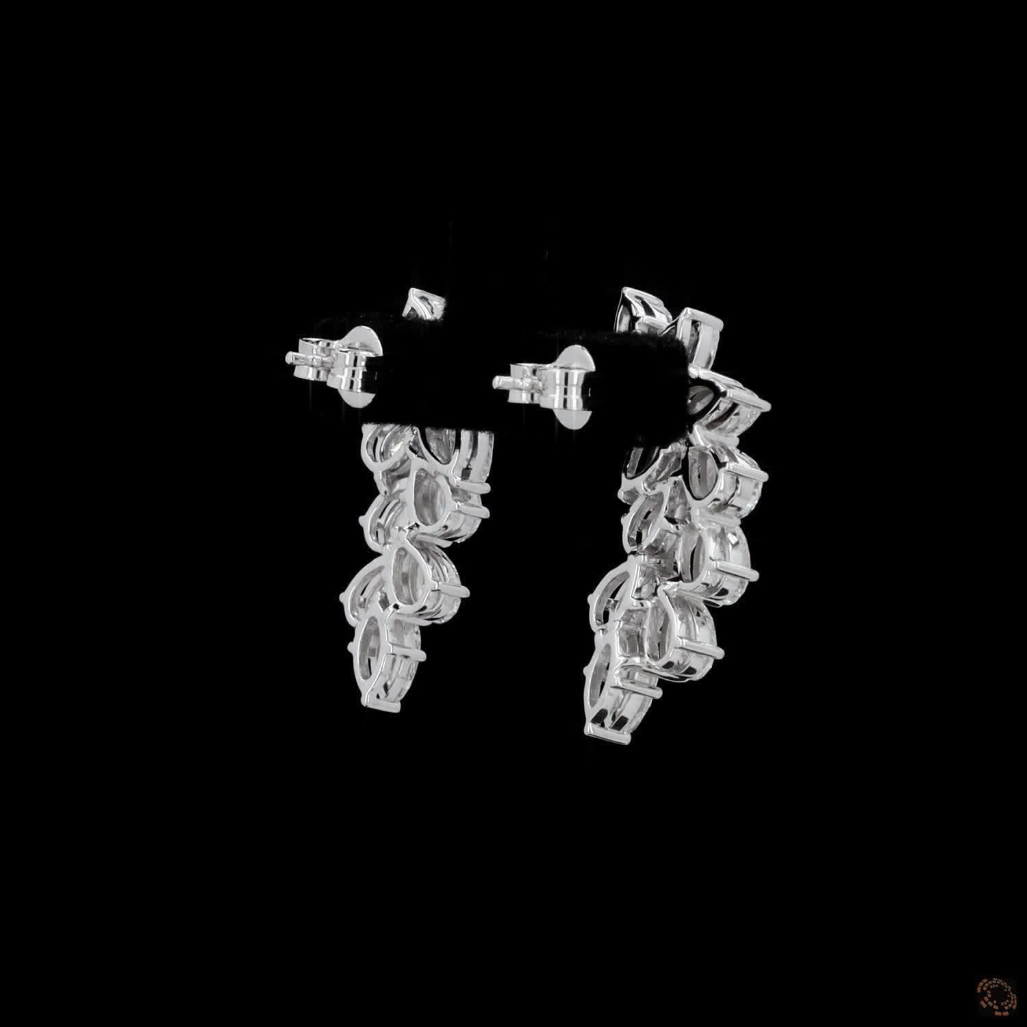 4.38 Ct High-clarity multi-shape diamonds marquise and pear cuts set at dynamic angles for multidirectional sparkle