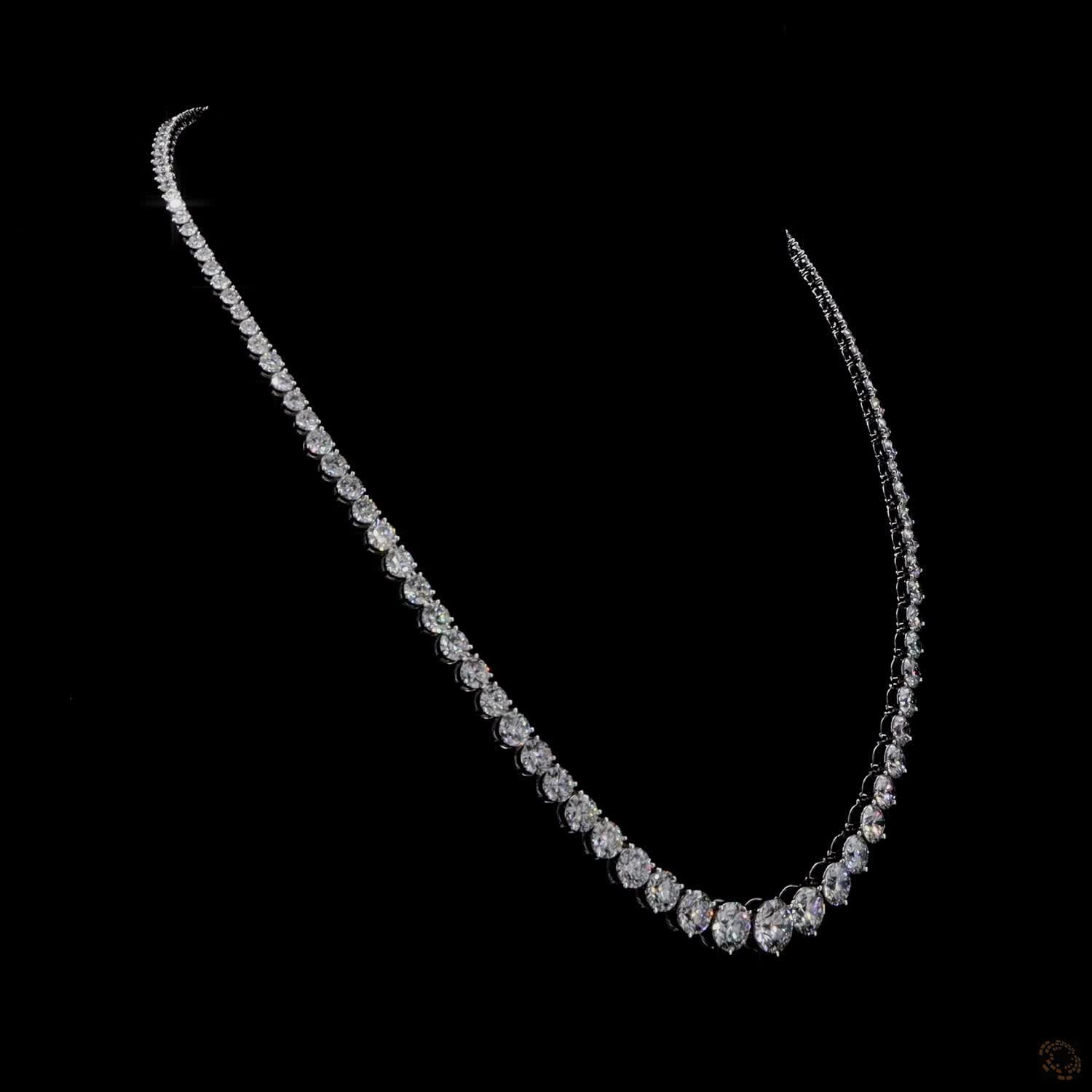 29.08 Ct Accentuate your neckline with this graduated round-cut diamond tennis necklace