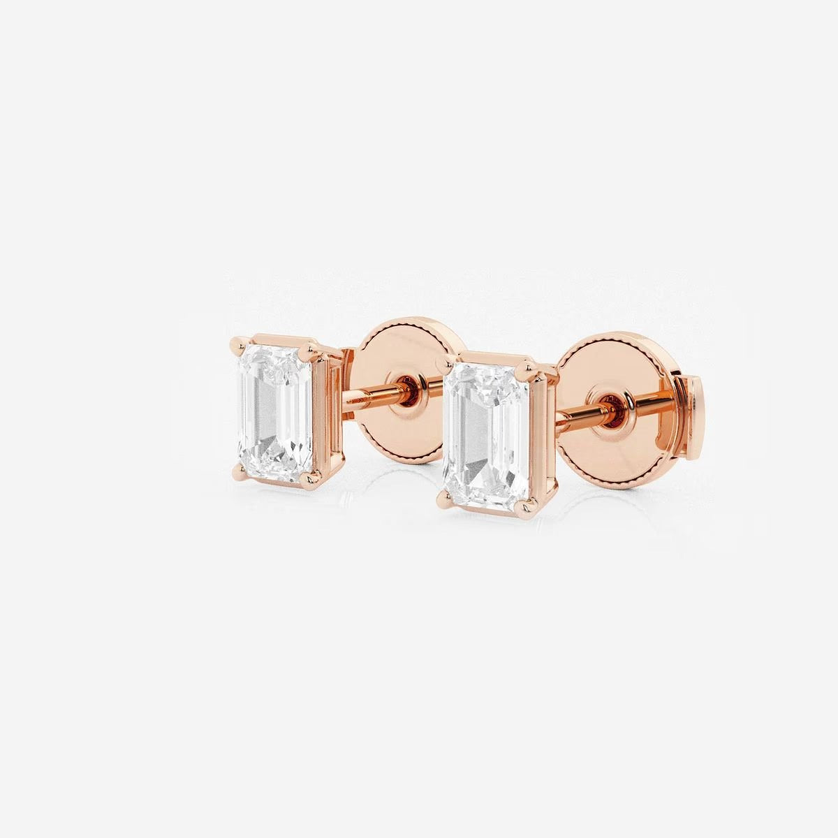 1.00 Ct Emerald Shap Near-Colorless 4-Prong Stud Earrings