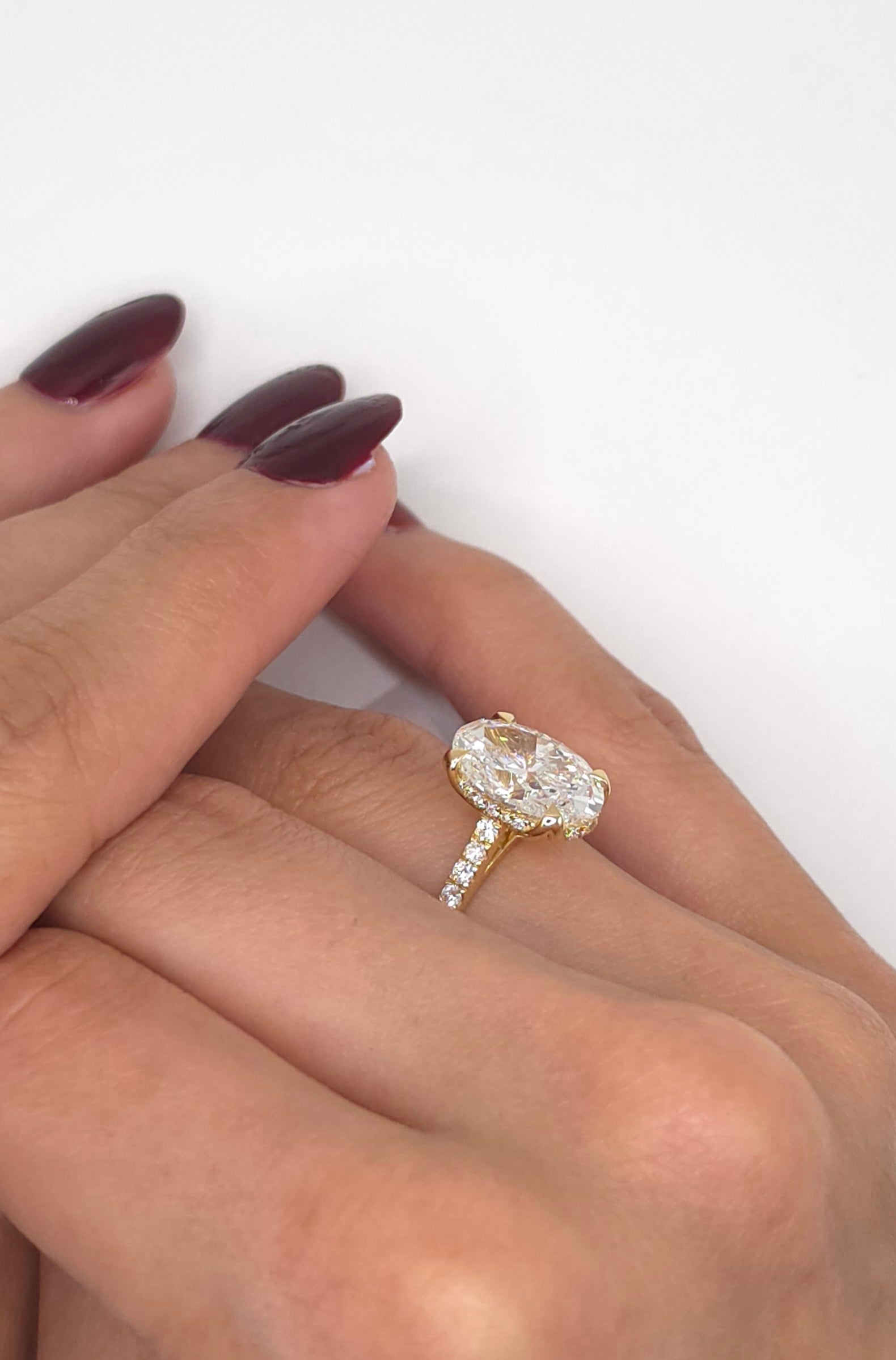 4.04 Ct Oval Cut Lab Grown Diamond Engagement Ring with Hidden Halo in Yellow Gold