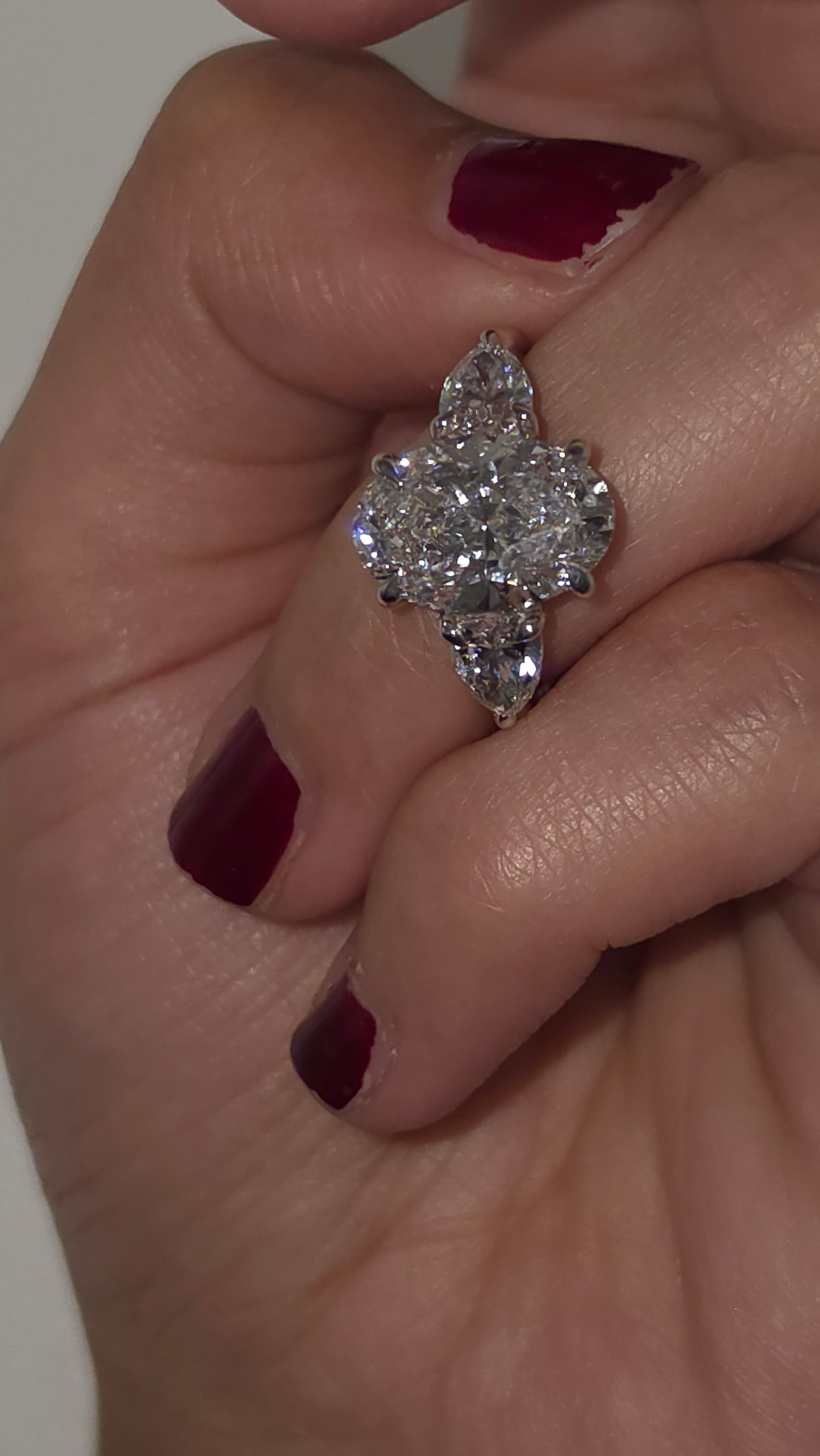 4.49 Ct Luxury Oval Solitaire Ring with Pear Side Stones