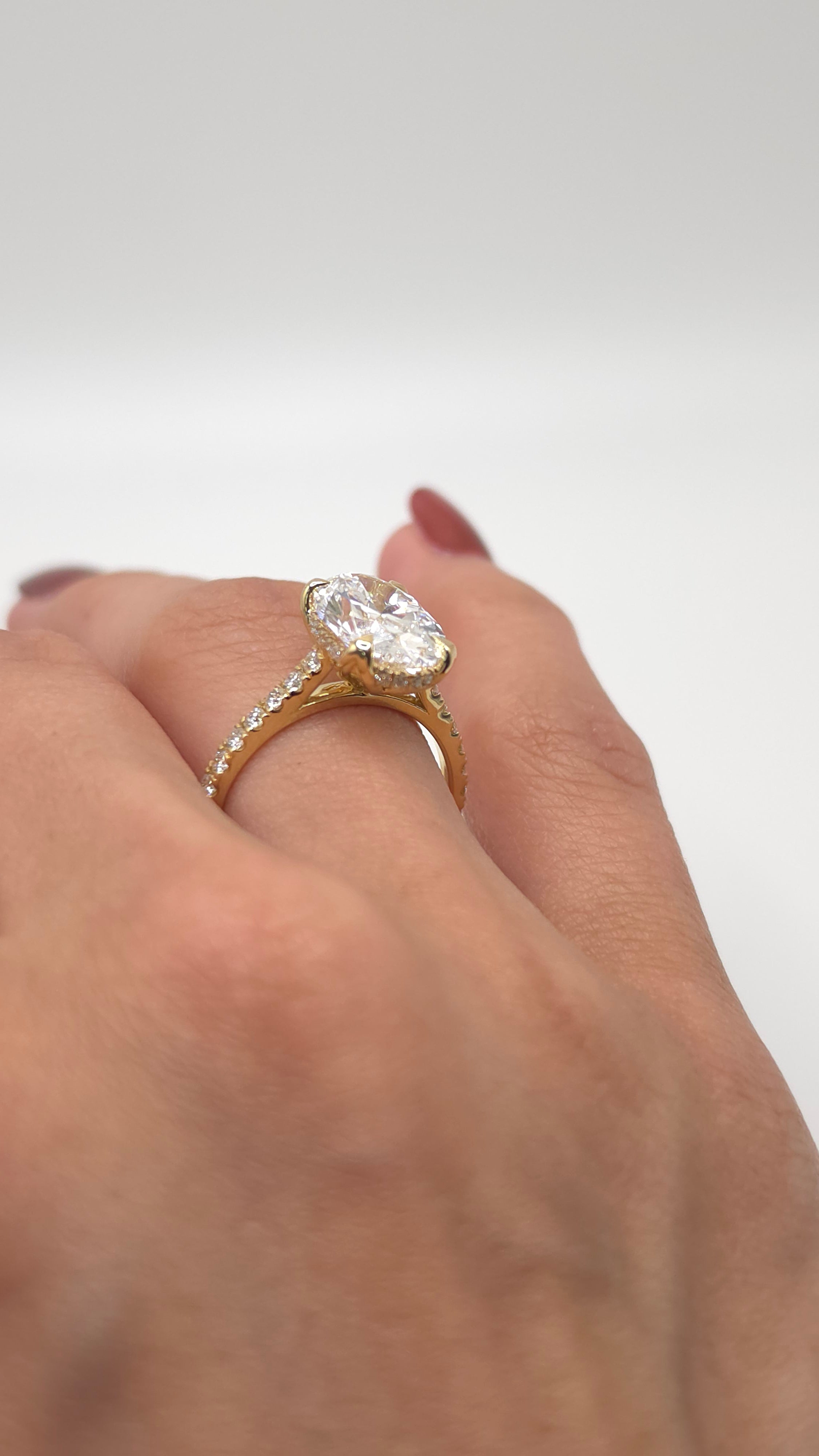 4.04 Ct Oval Cut Lab Grown Diamond Engagement Ring with Hidden Halo in Yellow Gold