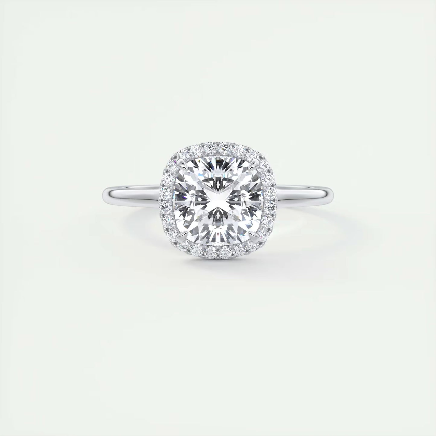2.10 CtThe Breezy Halo Cushion Center with French Set Halo Ring