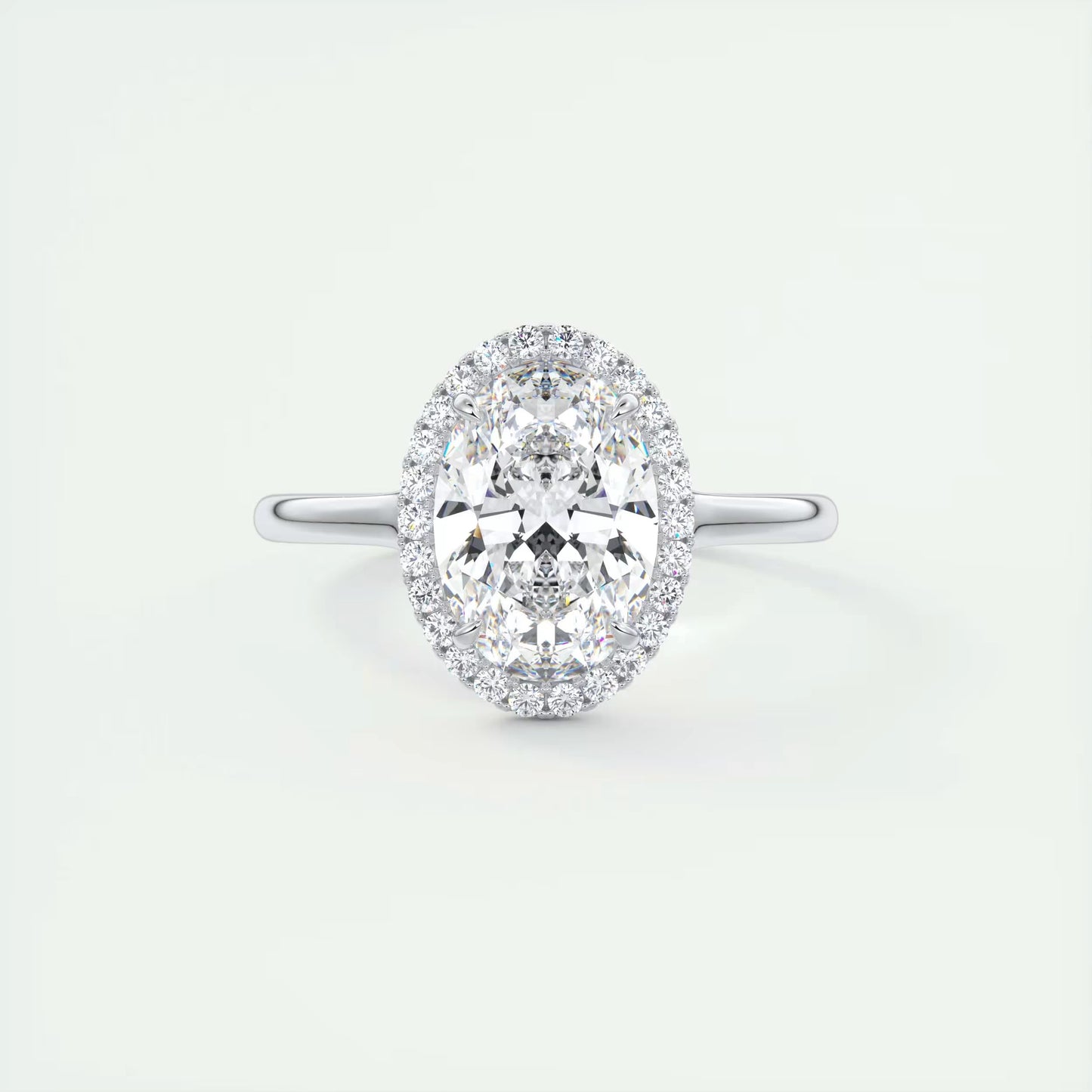 2.10 Ct The Breezy Halo Oval Center with French Set Halo Ring