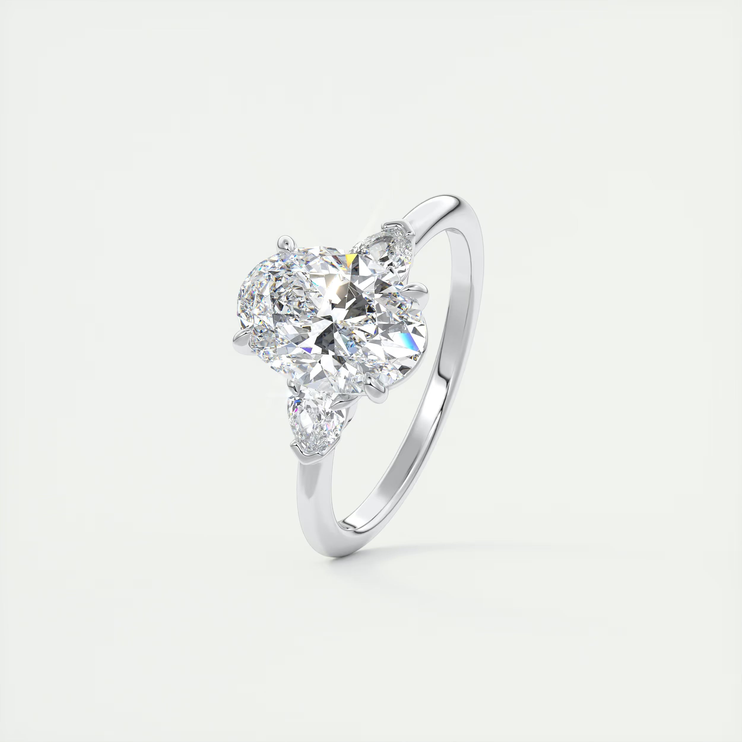 2.25 Ct Plunge Center Stone Oval & Side Stone Pear Engagement Rings