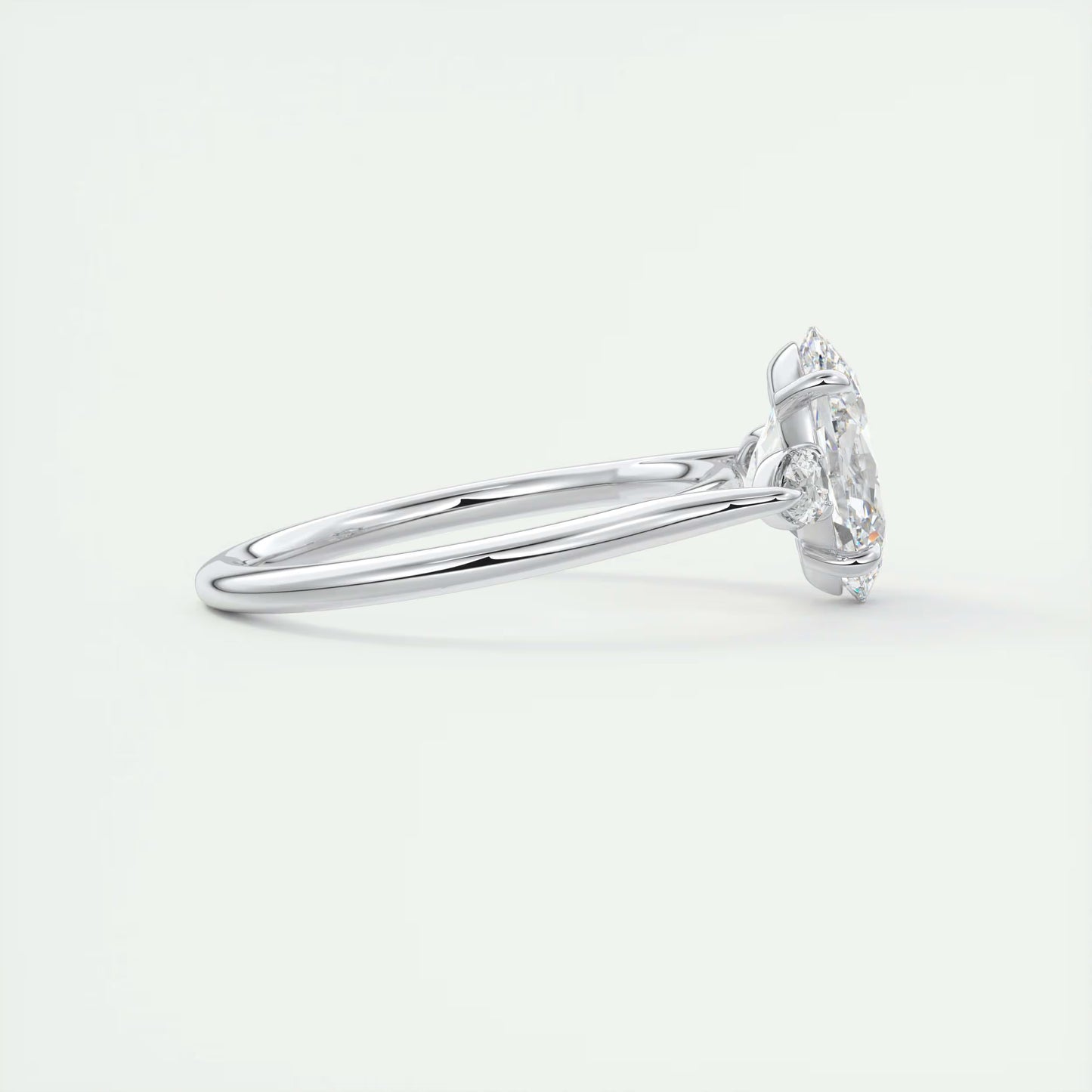 2.50 Ct Breezy Pears Oval Solitaire Side Stone Rings