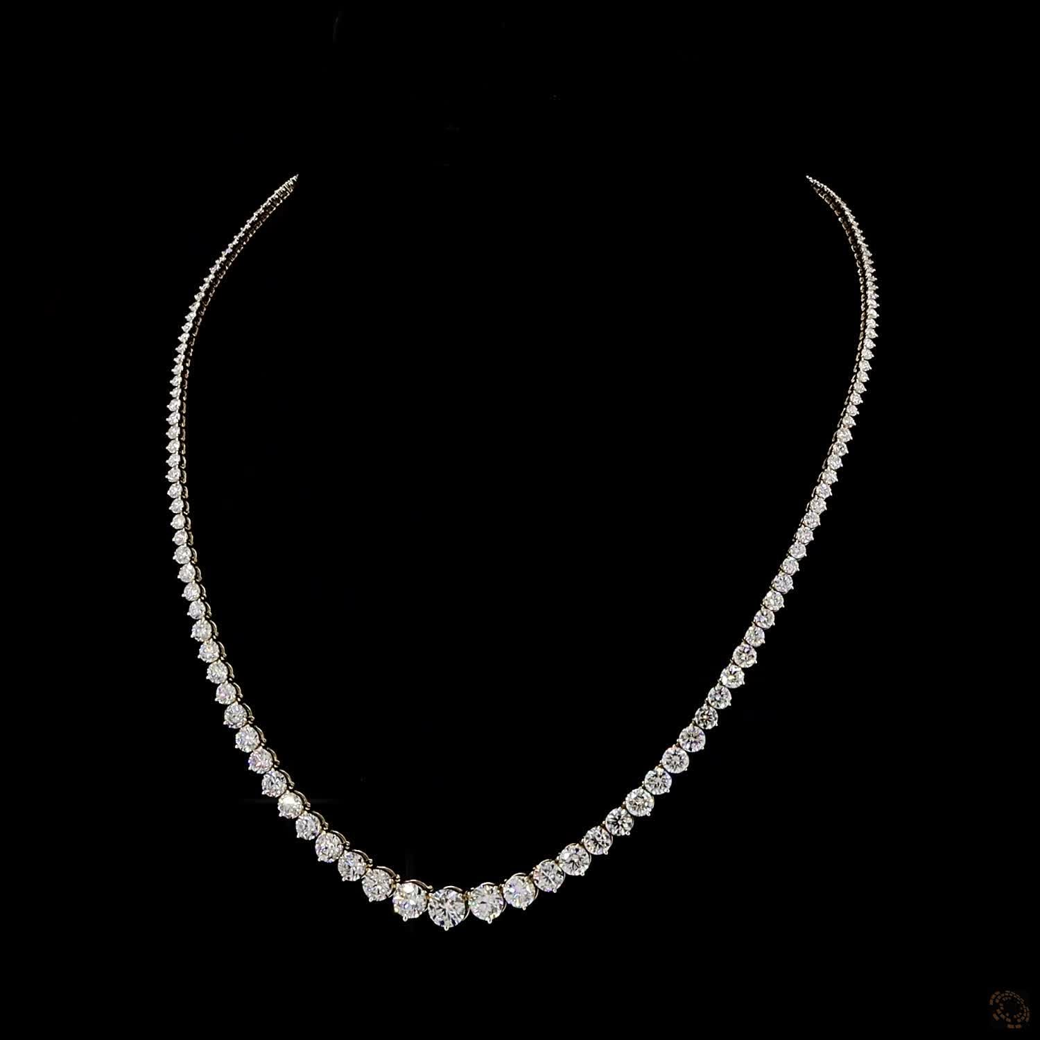 29.06 Ct Round Brilliant Cut diamonds seamlessly graduated from larger center stones down to smaller accent diamonds toward the back