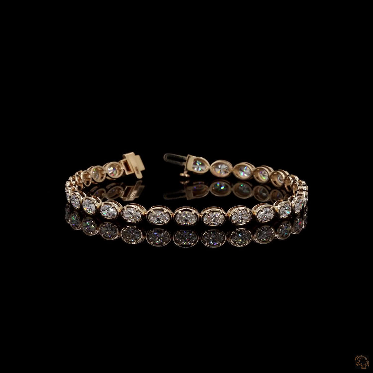 6.92 Ct Bezel-Set Oval Cut Diamond Tennis Bracelet in Yellow Gold