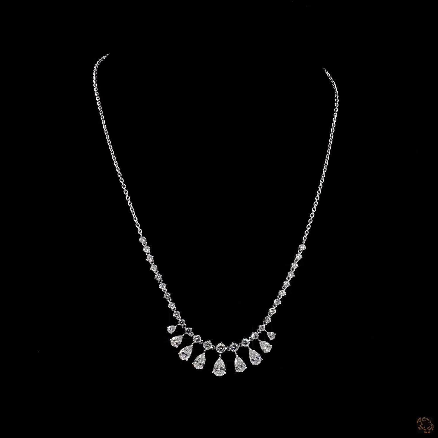 6.34 Ct Elegant fringe-style station necklace with a central arc of suspended, articulated pear-cut diamond drops