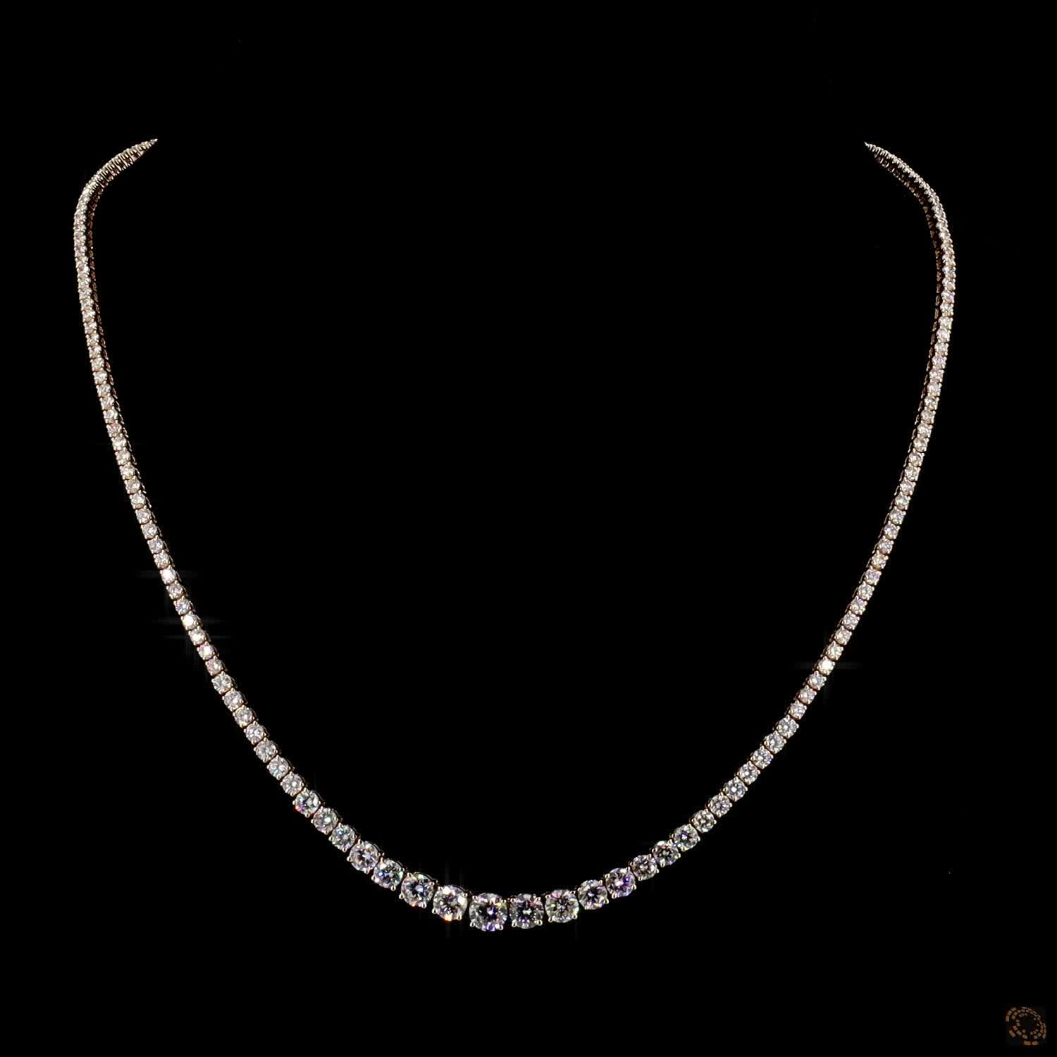 9.7 Ct Riviera-style tennis necklace featuring a smooth, symmetrical graduation of round brilliant diamonds leading to a central focal point