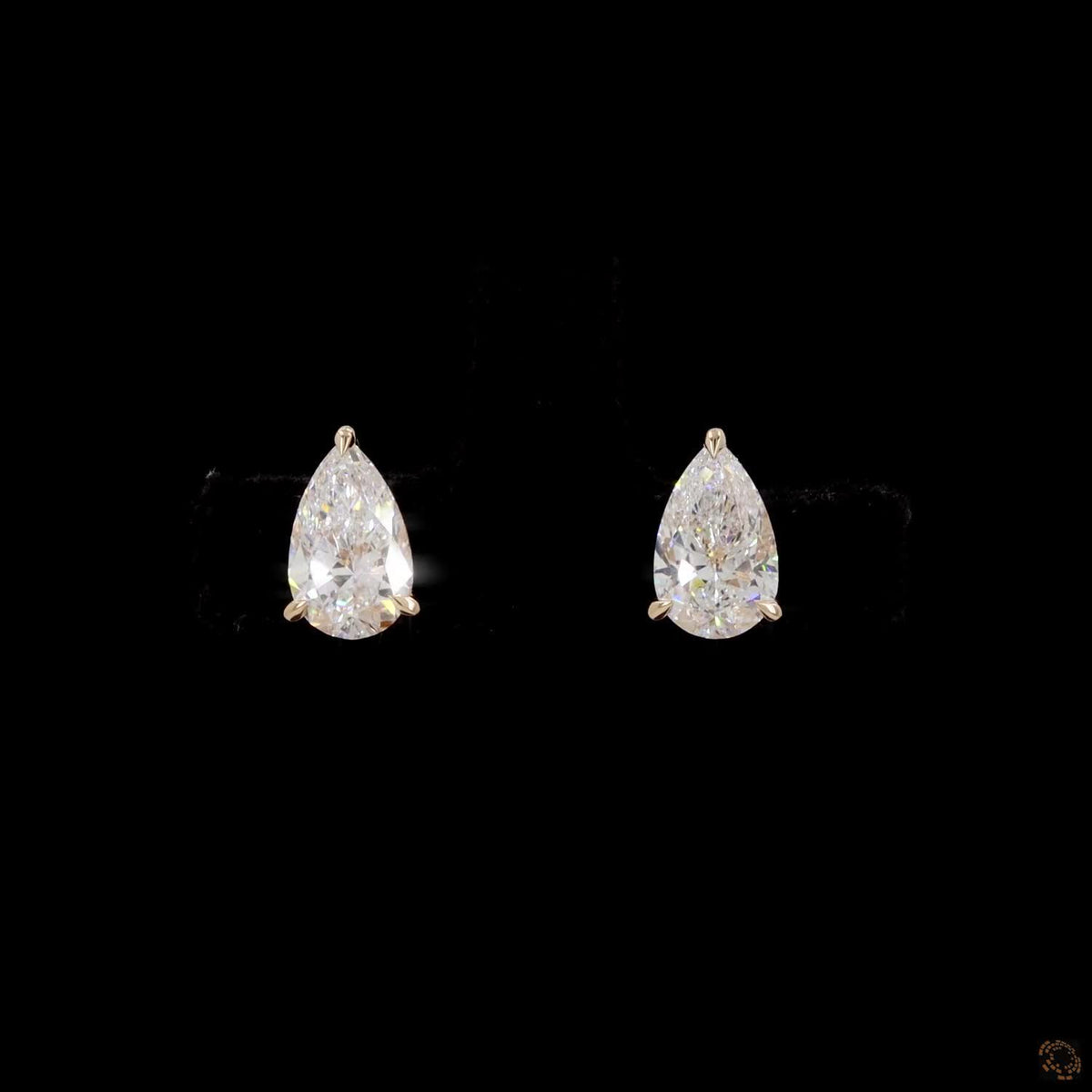 2.01 Ct Three-Prong Pear Cut Diamond Stud Earrings in Yellow Gold