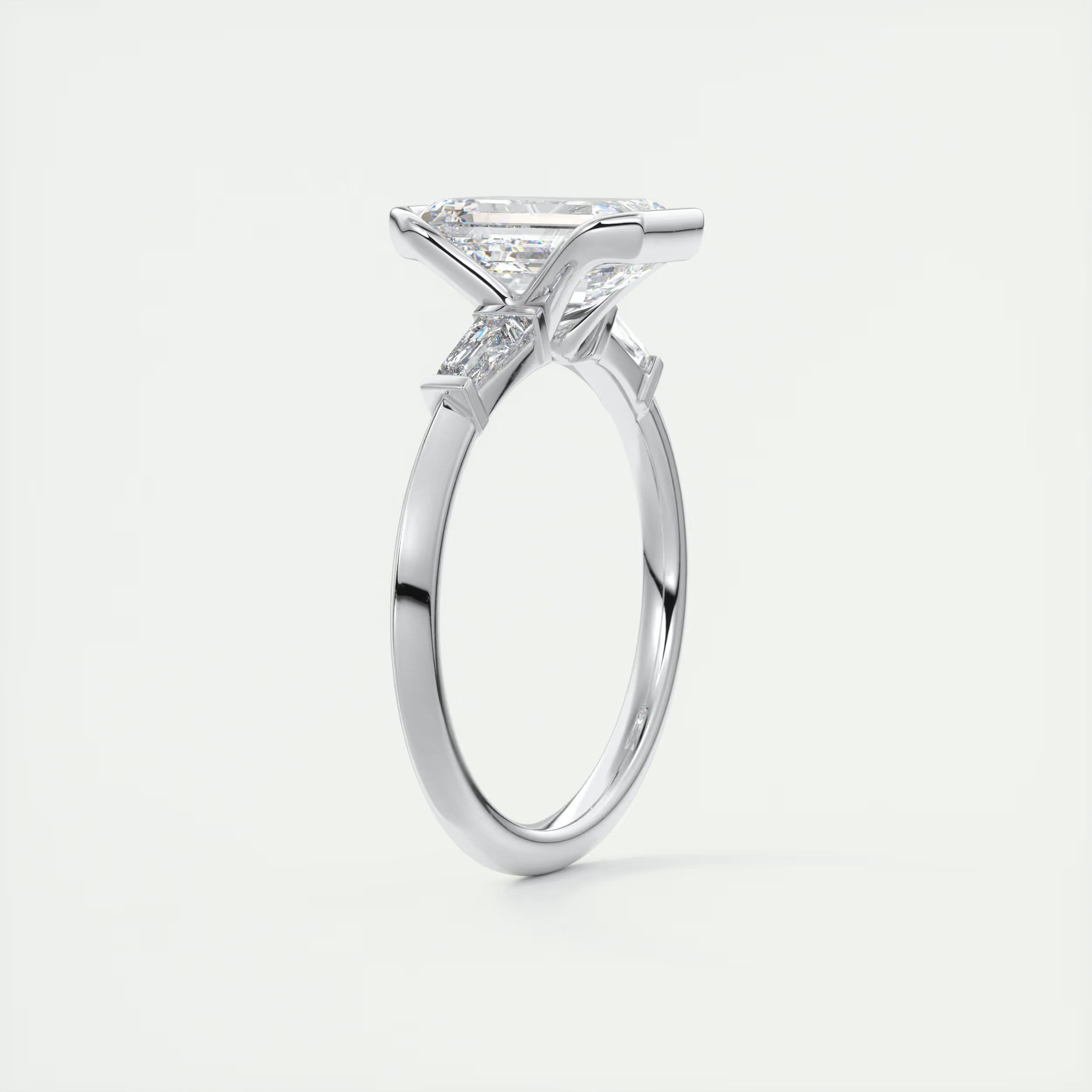 2.30 Ct Center Stone Emerald - Half Bezel Side Stone Tap Baguette Engagement Rings