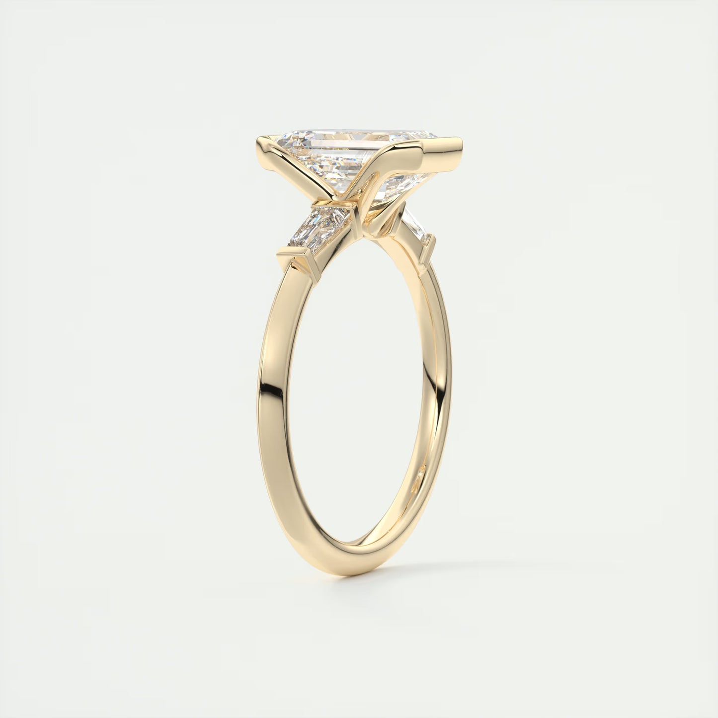 2.30 Clutch Three Stone Emerald - Half Bezel Three Stone Engagement Rings