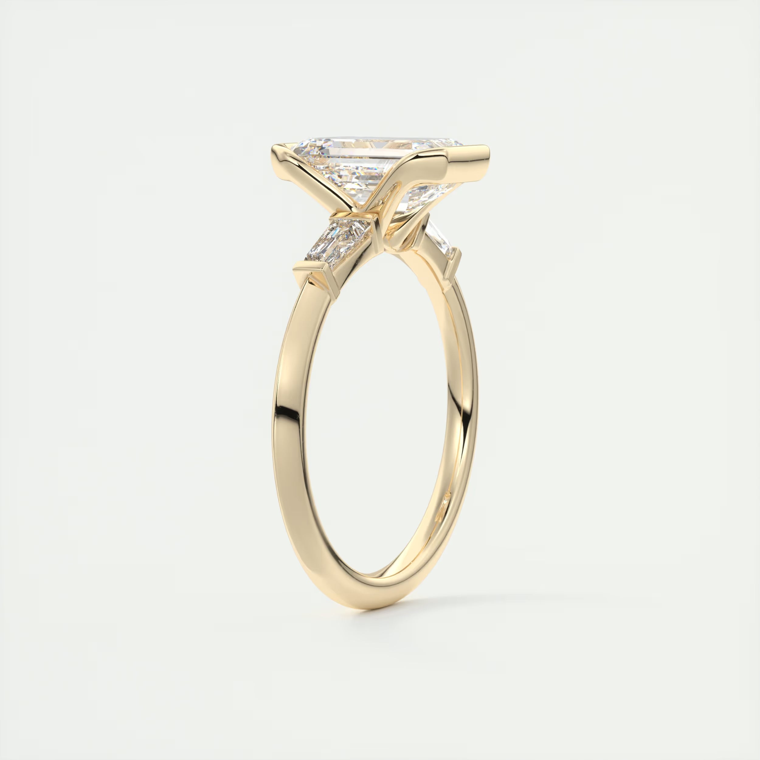 2.30 Ct Center Stone Emerald - Half Bezel Side Stone Tap Baguette Engagement Rings
