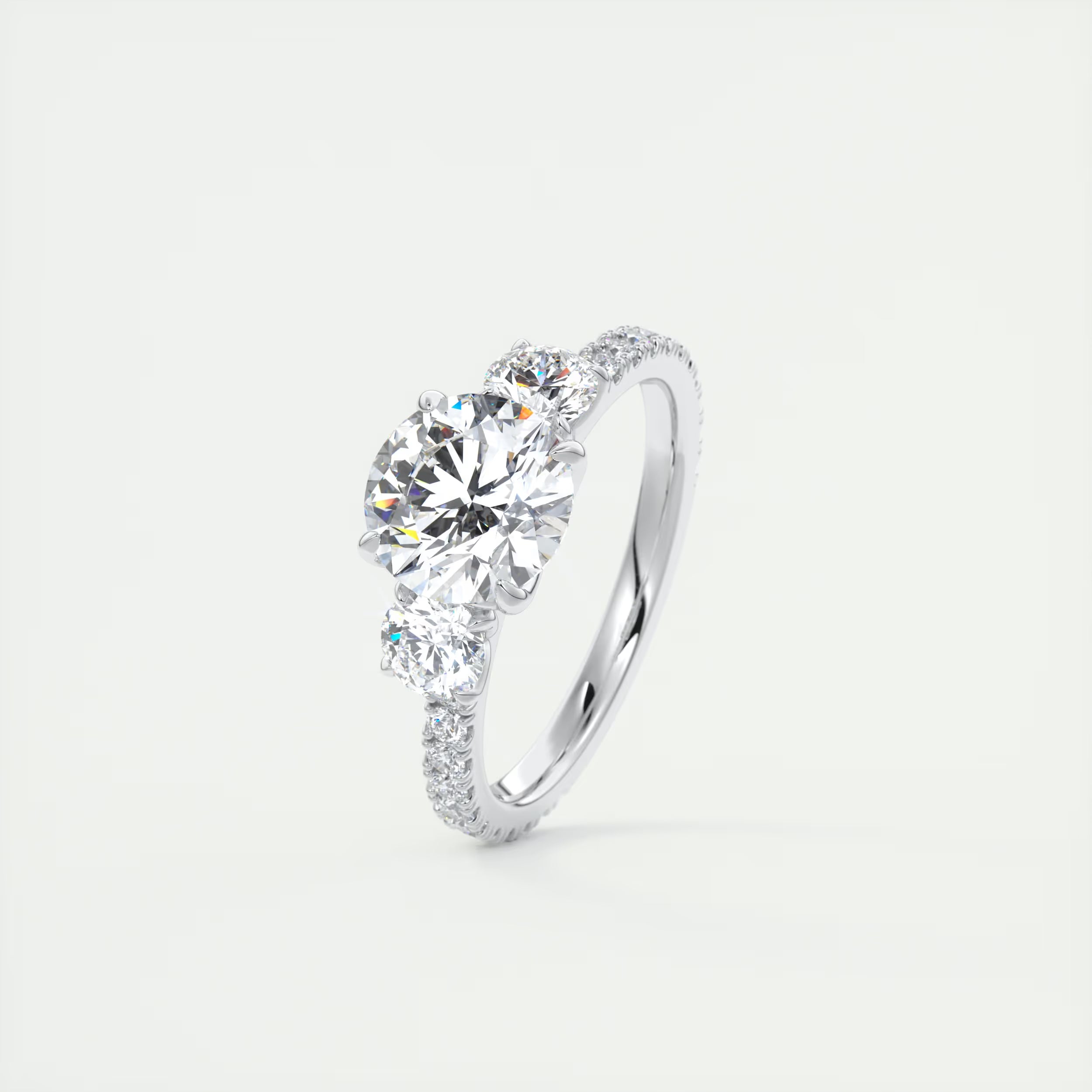 2.15 Ct Royale Three Stone Round -Floral French Set Pavé Engagement Rings