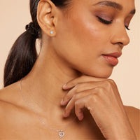 0.50 Ct Classic Cushion Shap Near-Colorless 4-Prong Stud Earring