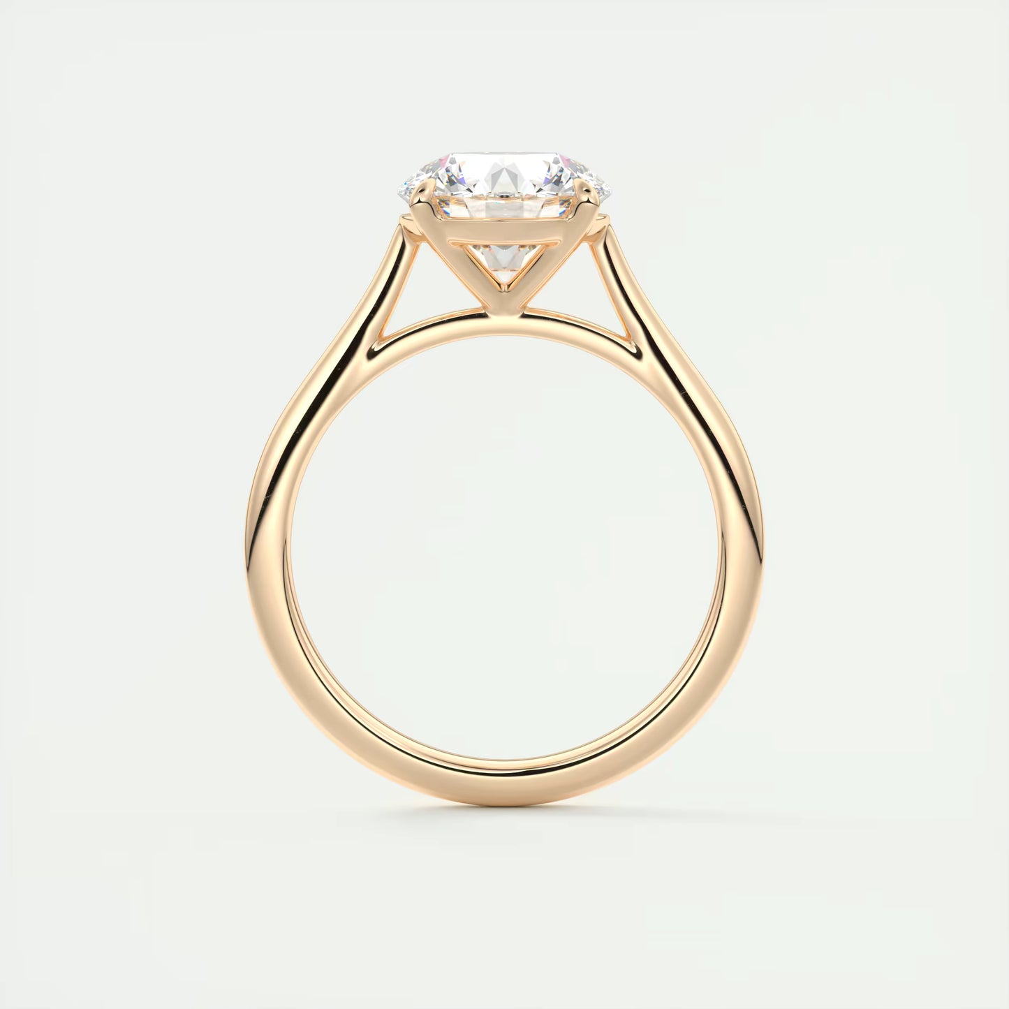 4-5 GM Round Solitaire with Four Eagle Claws Set Engagement Rings