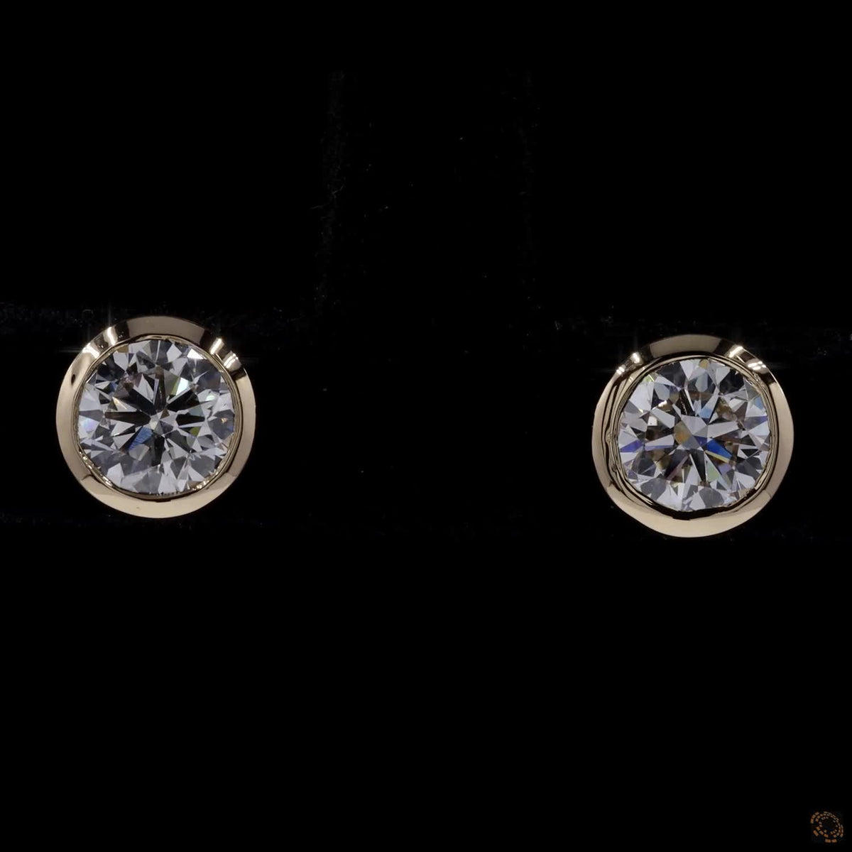 1.01 Ct Bezel-Set Round  Solitaire Diamond Stud Earrings in Yellow Gold