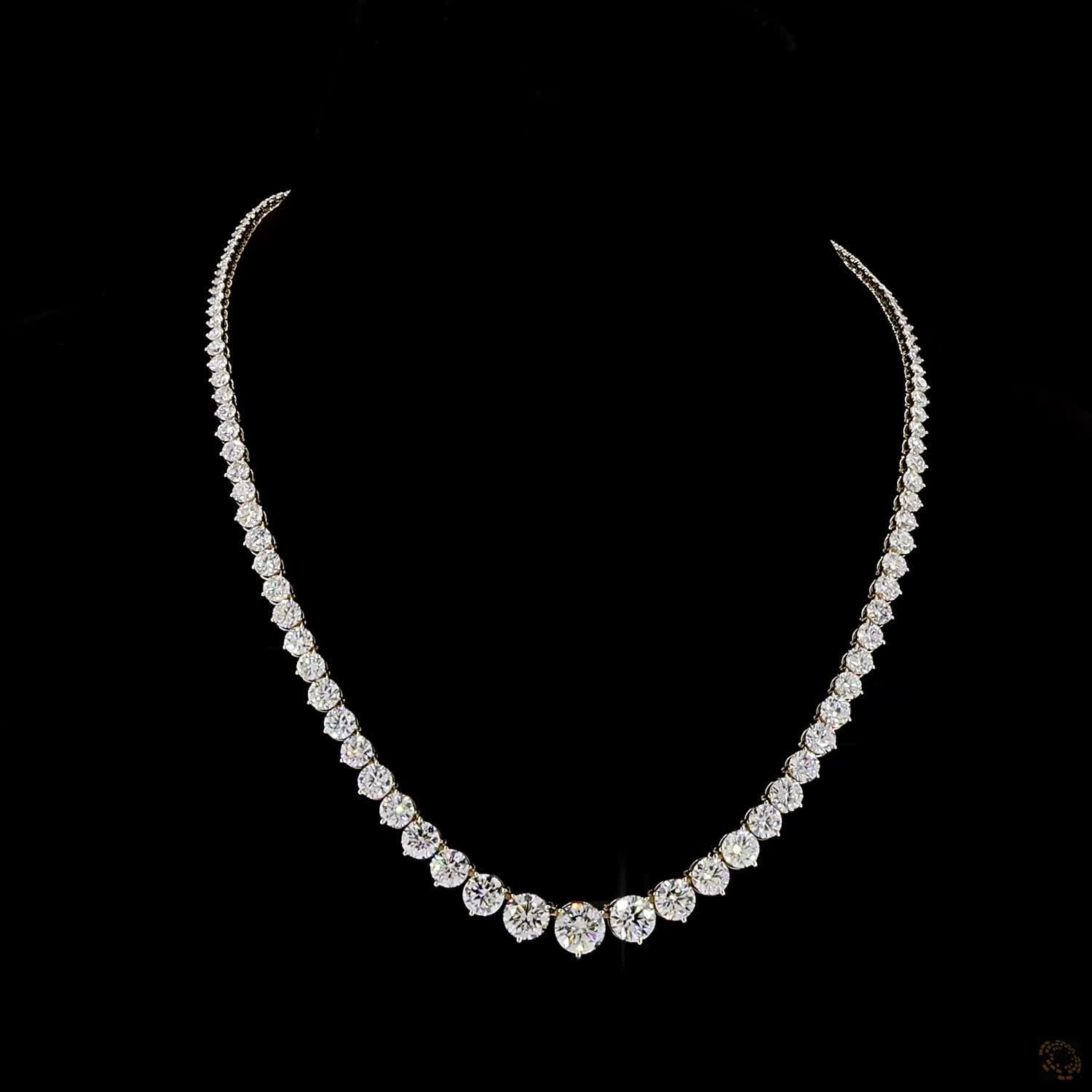 17.79 Ct Round Brilliant Cut diamonds arranged in a dramatic graduated layout tapering toward the back