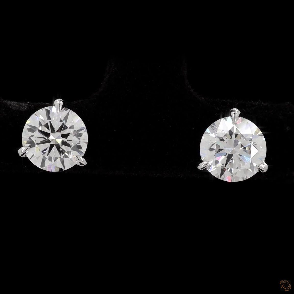 1.49 Ct Elevate your ear stack with these 3-prong martini solitaire diamond stud earrings in 14K white gold