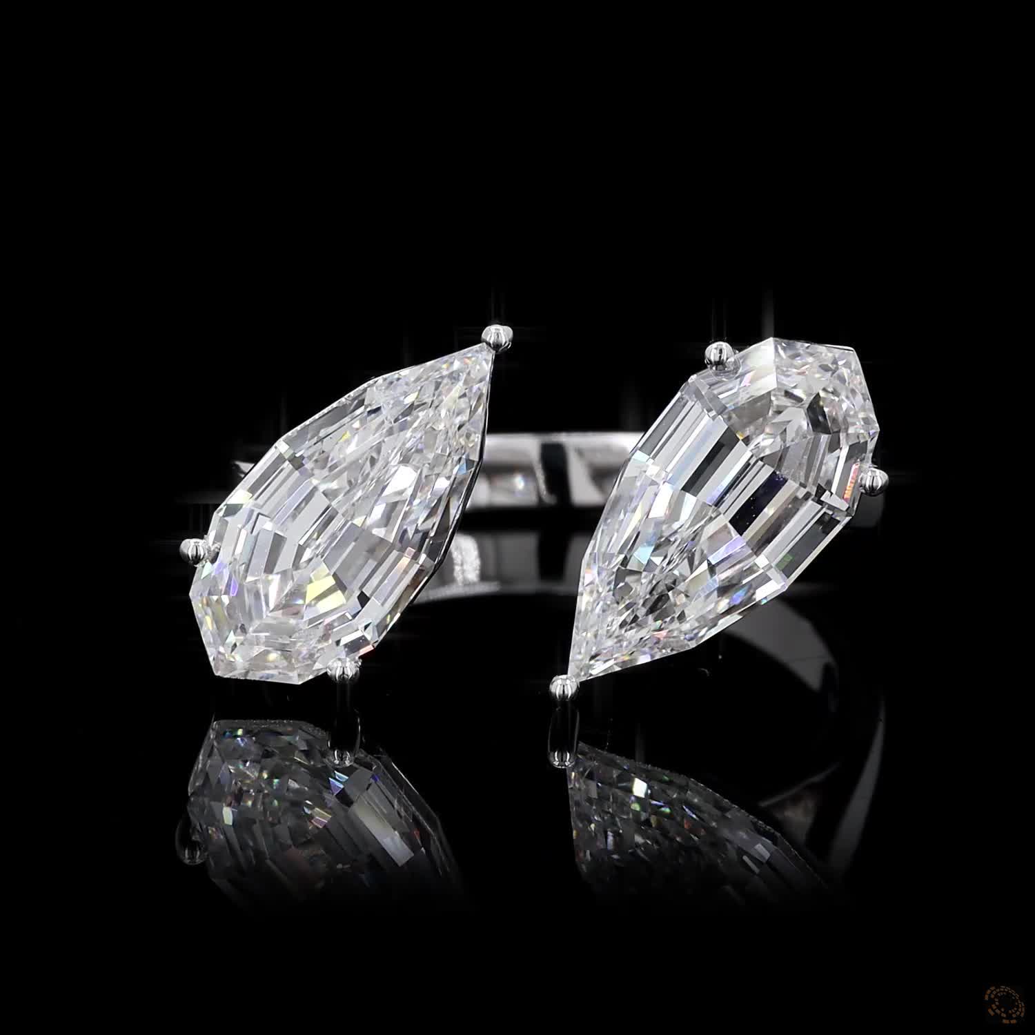 4.38 Ct Open cuff band with individually set basket prongs and protective V-prongs on the tips
