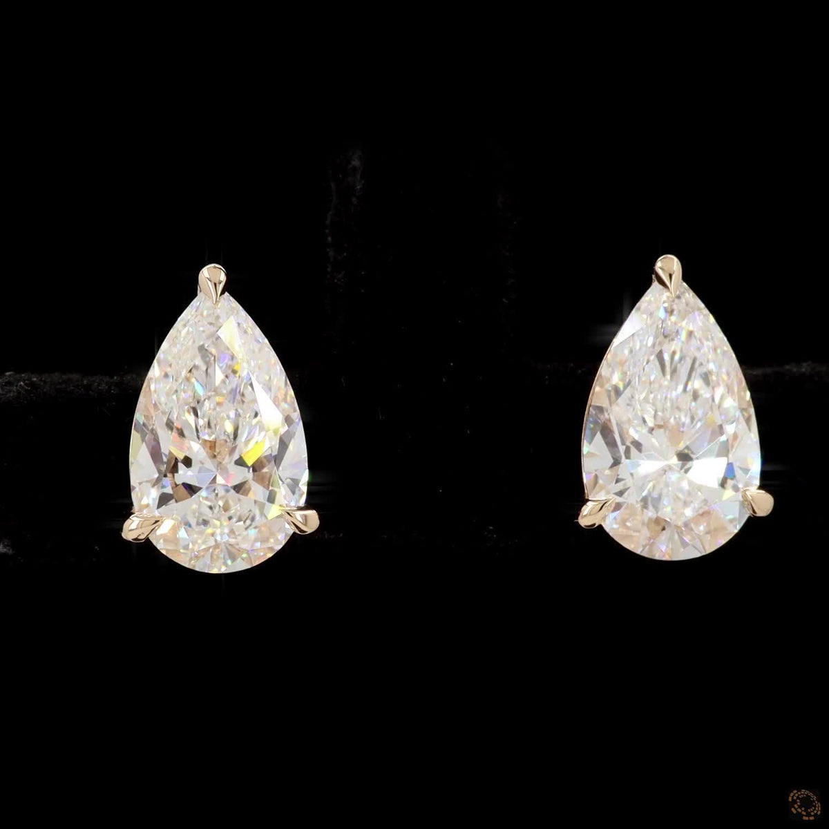 3.01 Ct Three-Prong Pear Cut Diamond Stud Earrings in Yellow Gold
