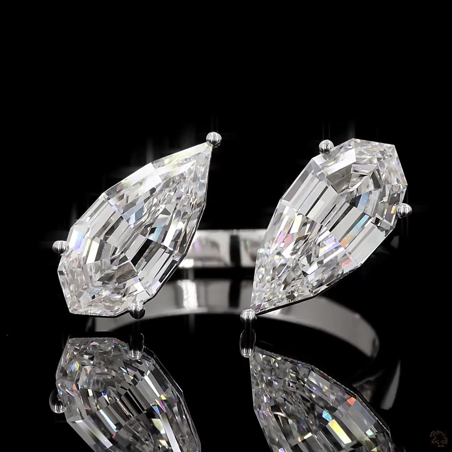 3.15 Ct Open cuff band with individually set basket prongs and protective V-prongs on the tips