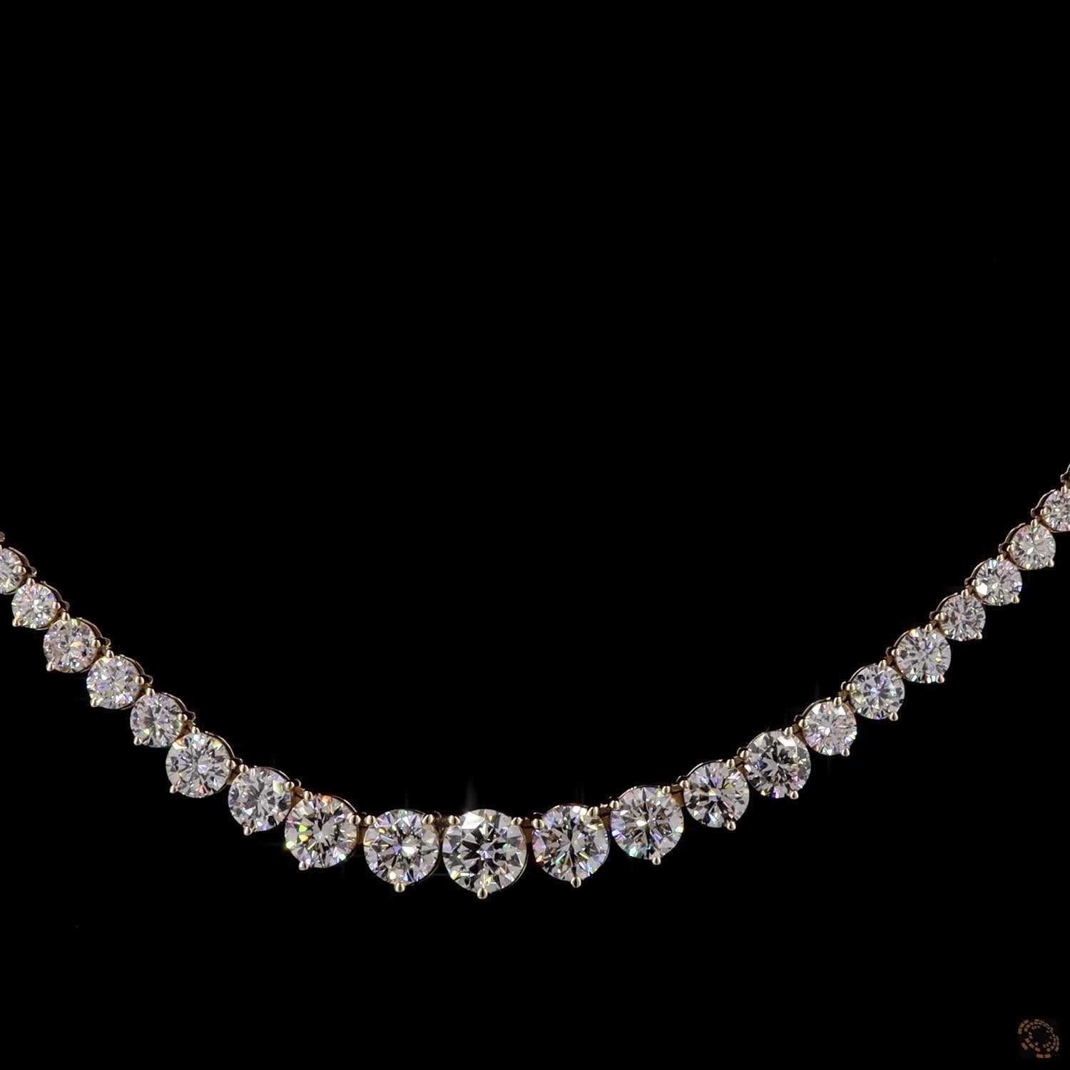 16.21 Ct Traditional Riviera-style tennis necklace defined by a smooth, proportional graduation of diamonds ending in a prominent center stone