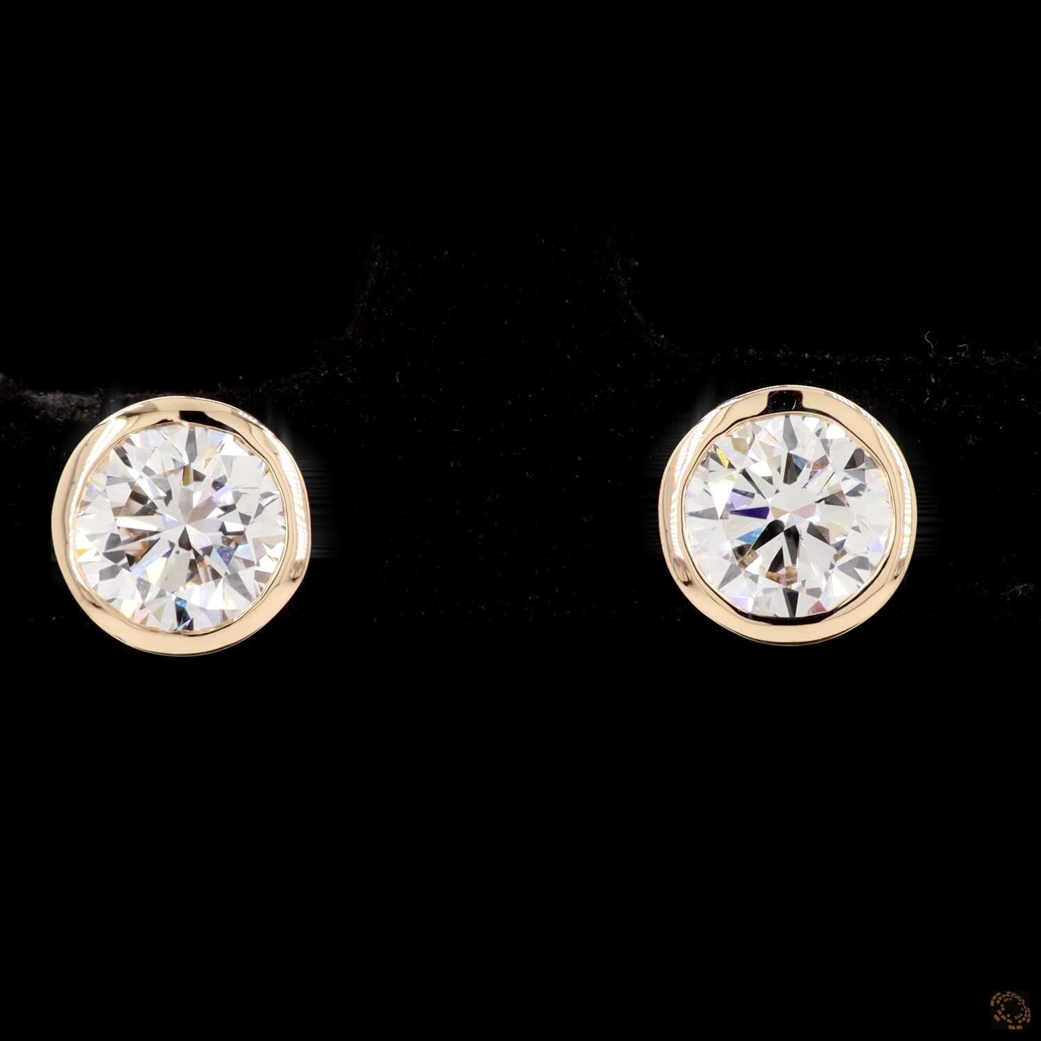 2.18 Bezel-Set Oval Cut Diamond Stud Earrings in Yellow Gold