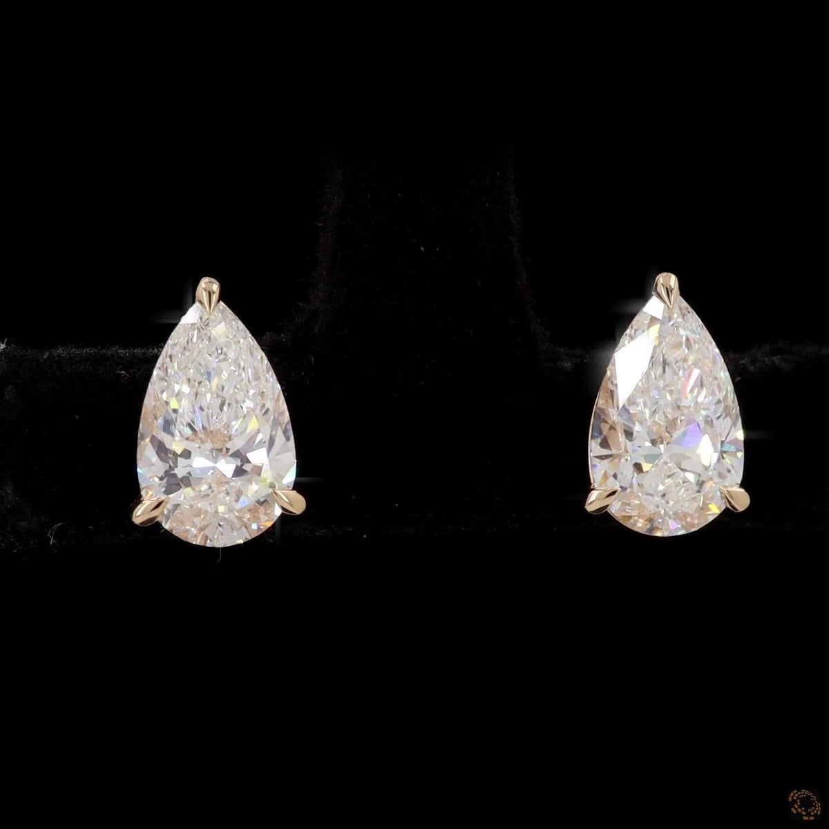 2.01 Ct Three-Prong Pear Cut Diamond Stud Earrings in Yellow Gold