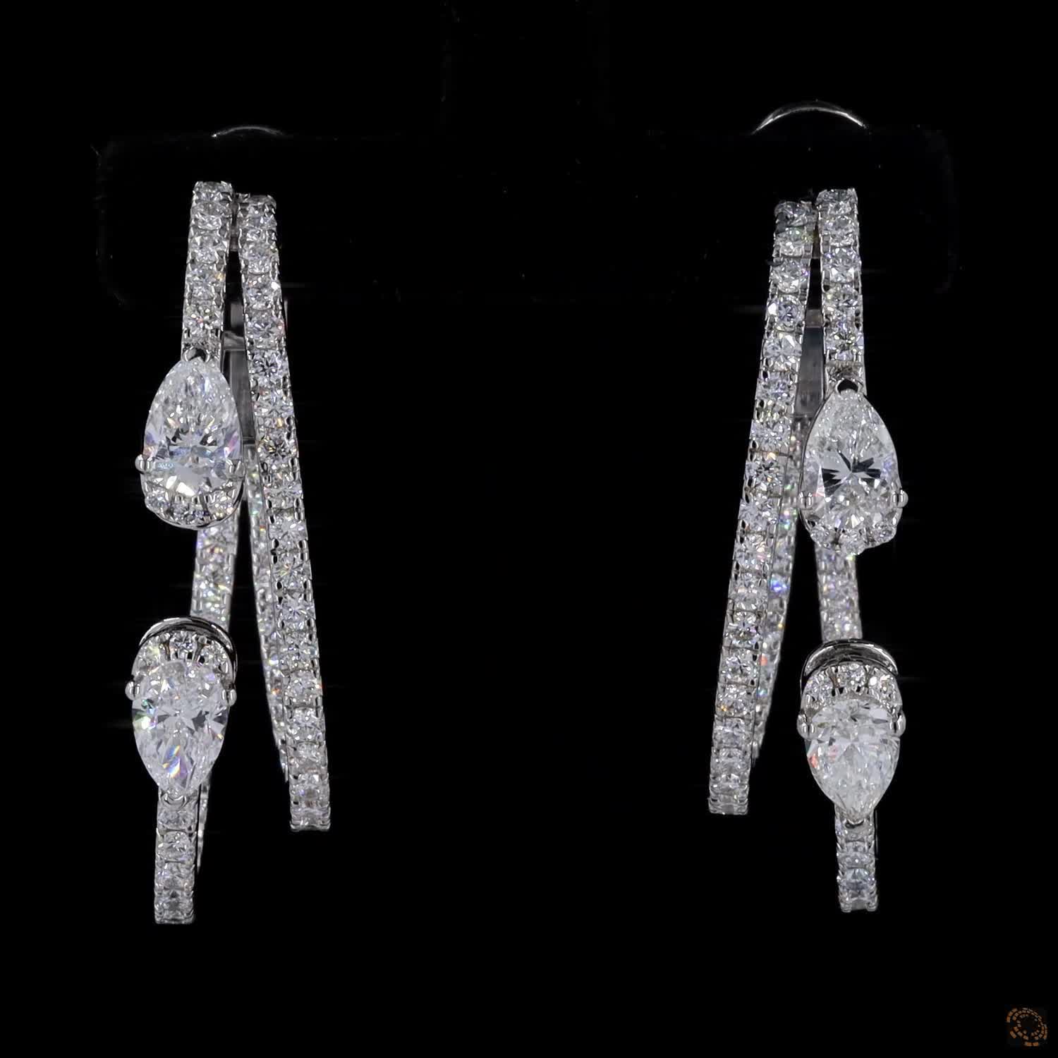 2.47 Cts Pear-Cut Diamond Drop Earrings in Luxurious White Gold