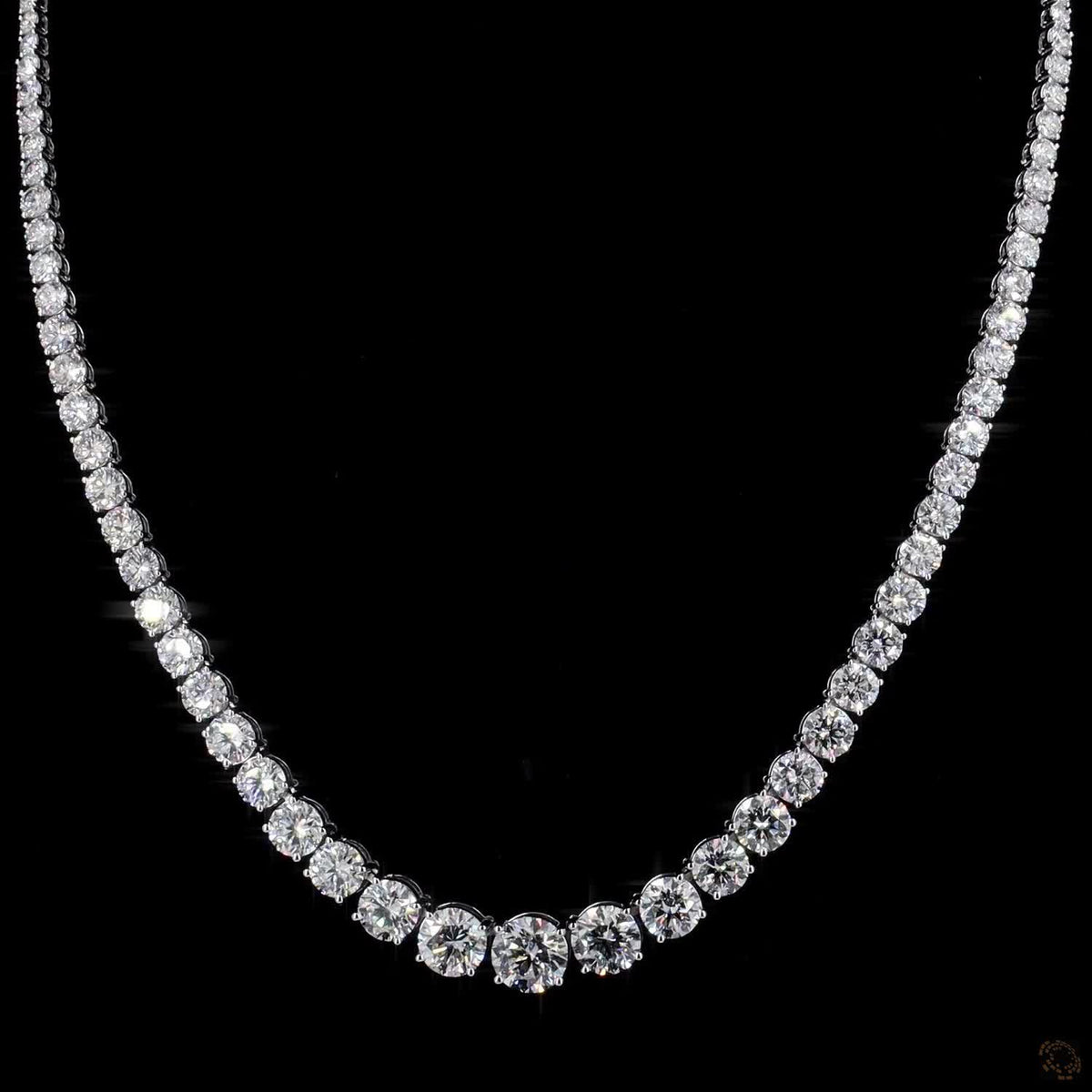 29.02 Ct Round Brilliant Cut diamonds seamlessly graduated from prominent center stones down to smaller accent stones toward the clasp
