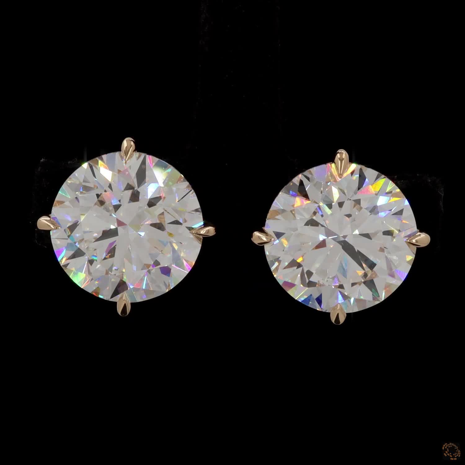 12.14 Ct High-clarity Round Brilliant Cut diamonds showing intense fire and brilliance