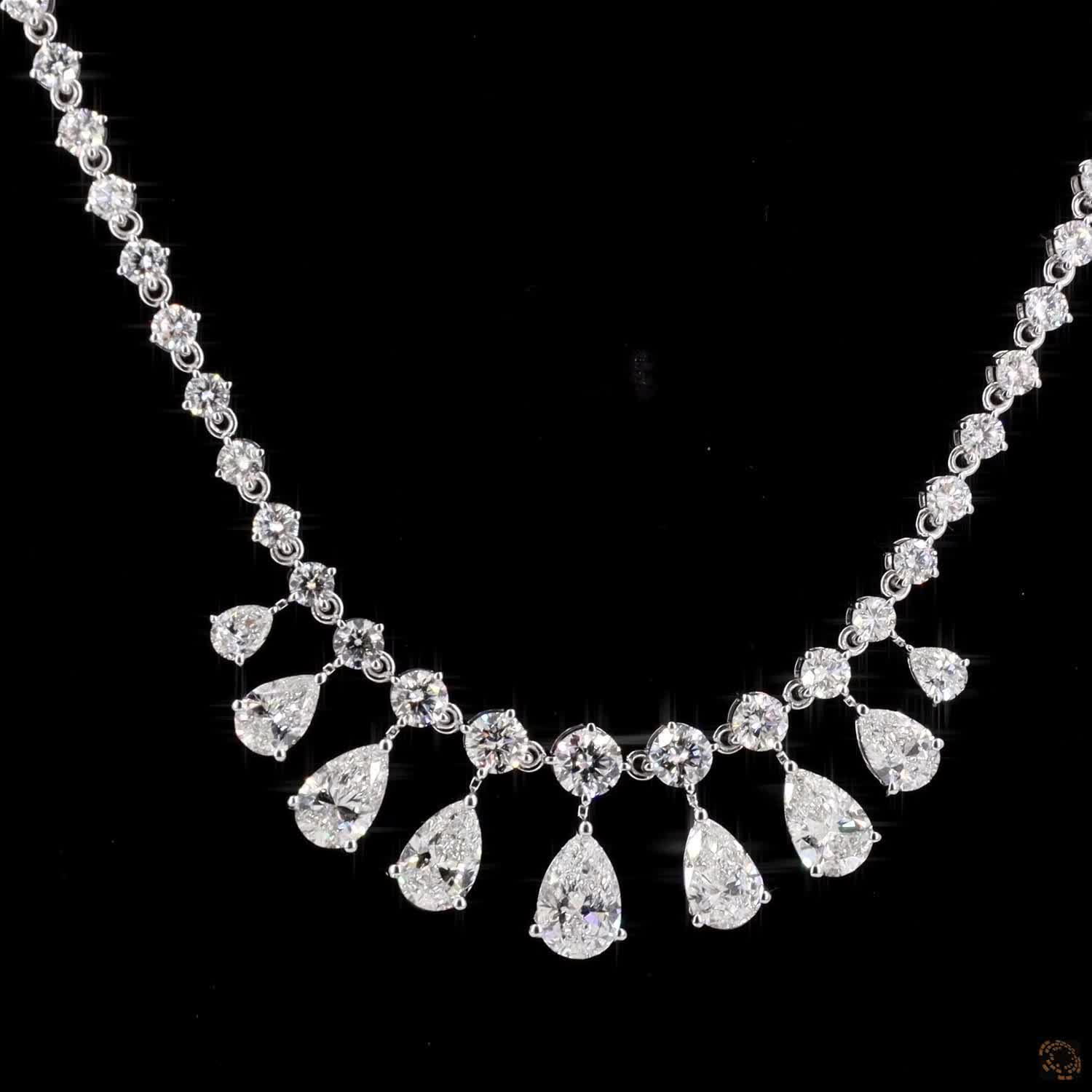 6.34 Ct Elegant fringe-style station necklace with a central arc of suspended, articulated pear-cut diamond drops