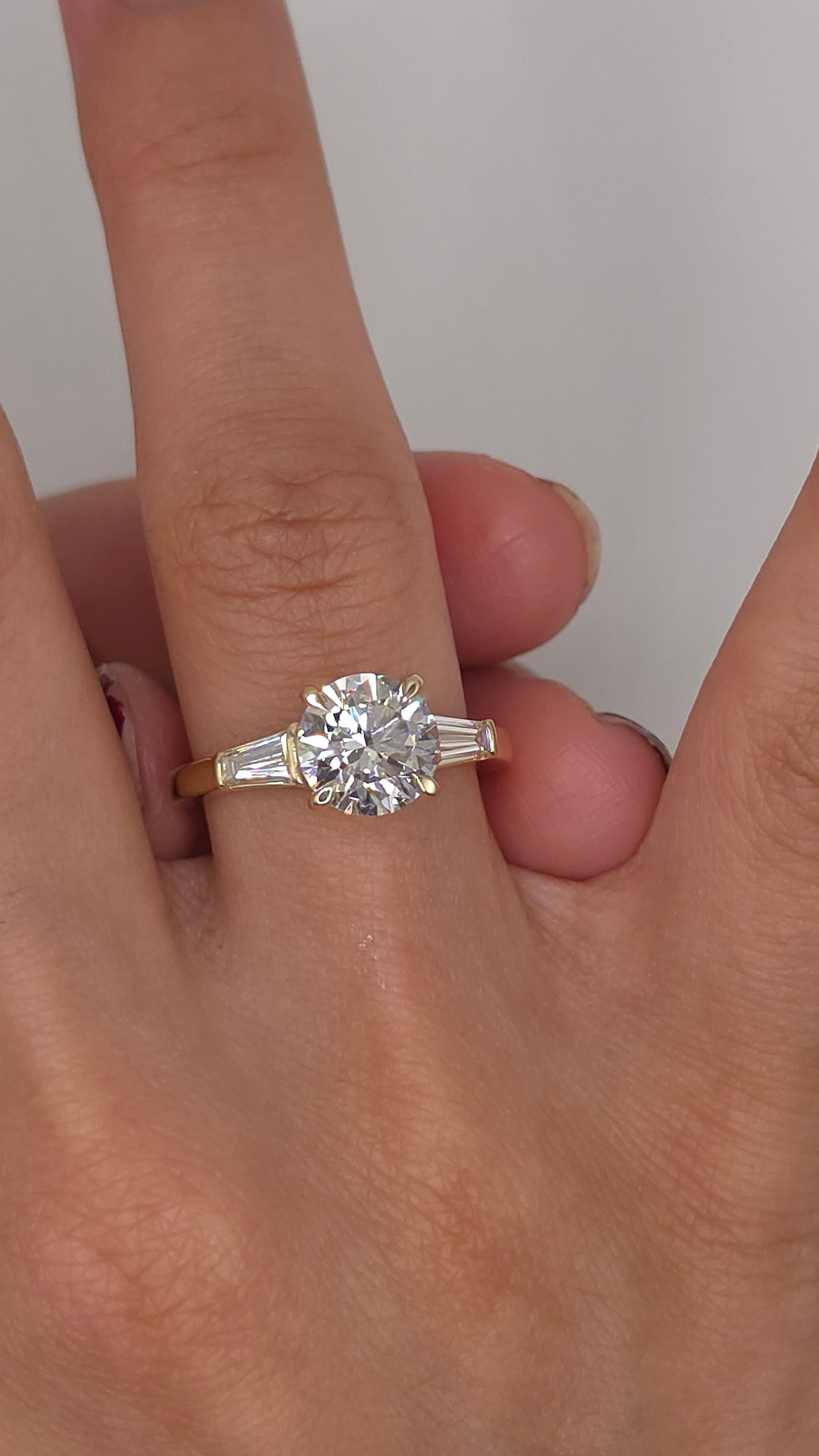 2.57 Ct Classic Round Brilliant Cut Diamond Three-Stone Engagement Ring with Tapered Baguette Side Stones