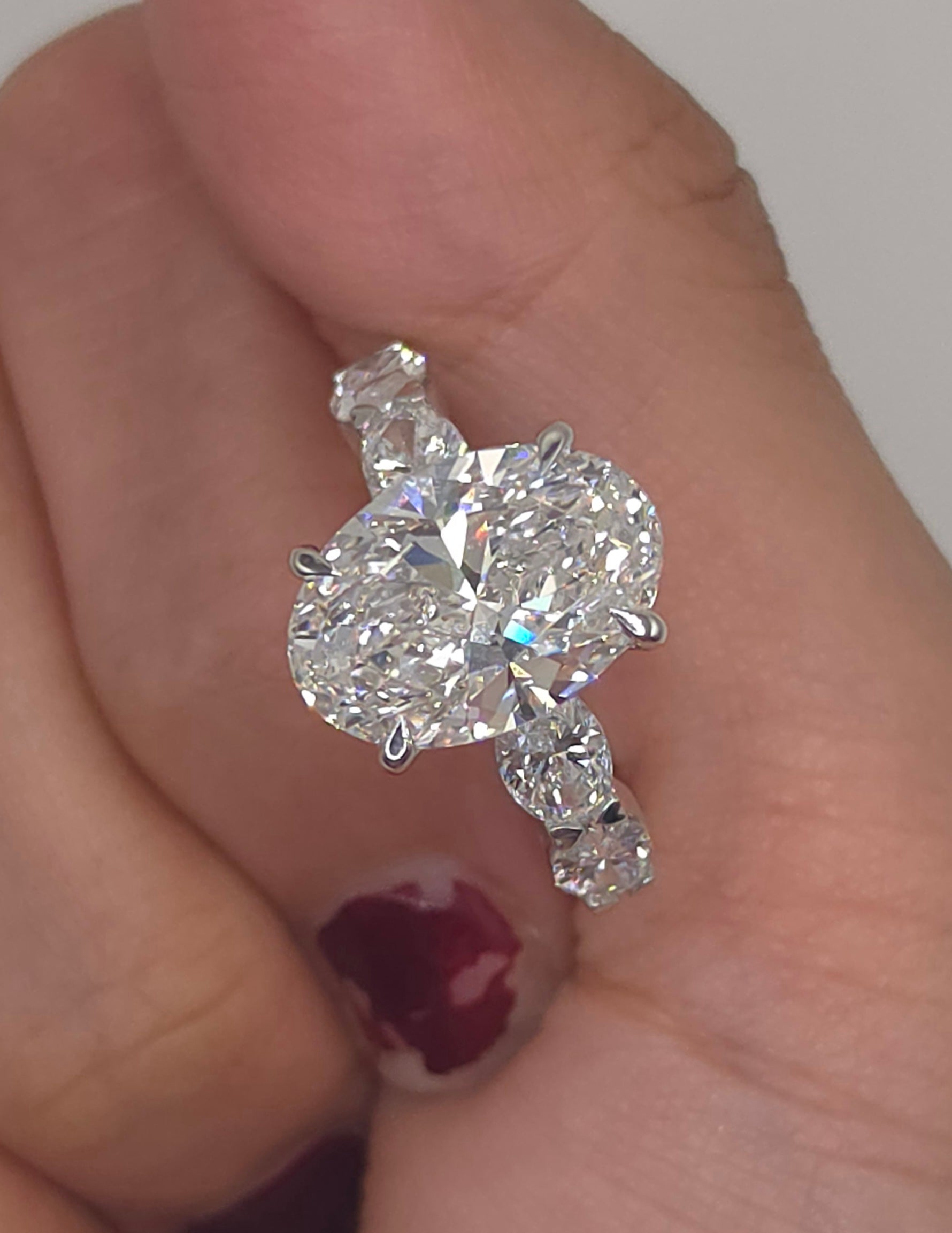 6.64 Ct The Grand Oval: Oval Cut Lab-Grown Diamond Ring with Graduated Oval Accent Shank