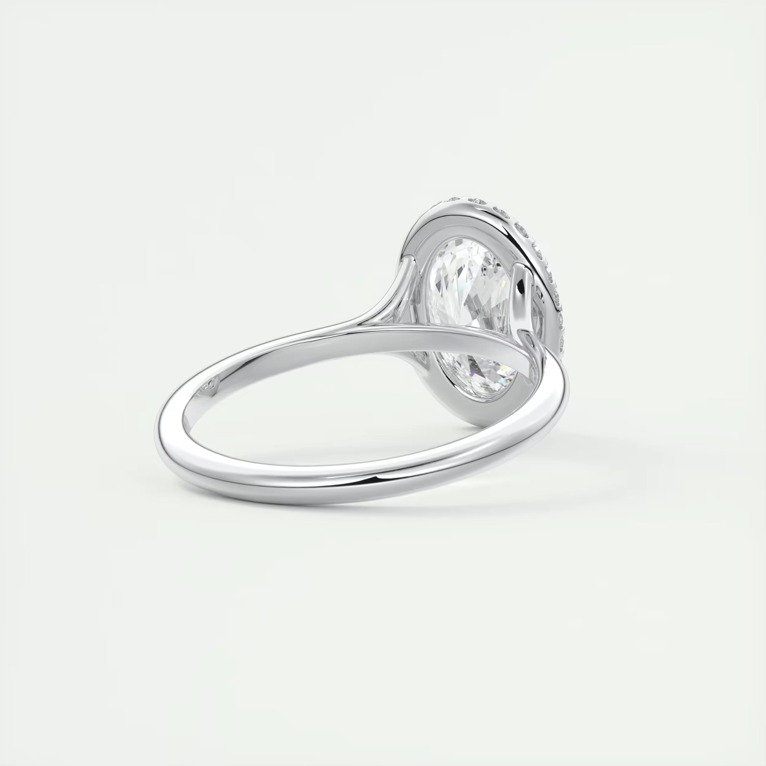2.10 Ct The Breezy Halo Oval Center with French Set Halo Ring