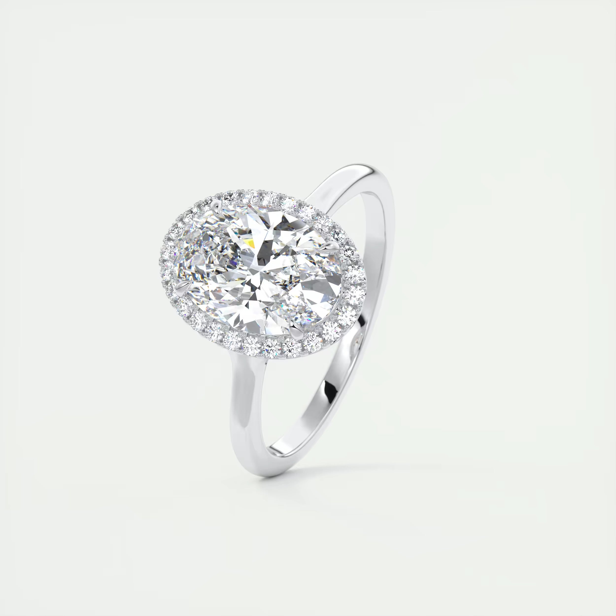2.10 Ct The Breezy Halo Oval Center with French Set Halo Ring