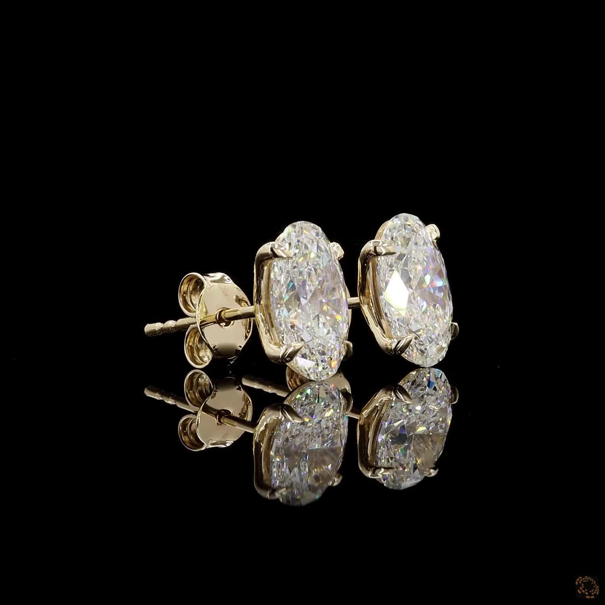 4.16 Ct Four-Prong Oval Cut Diamond Stud Earrings in Yellow Gold