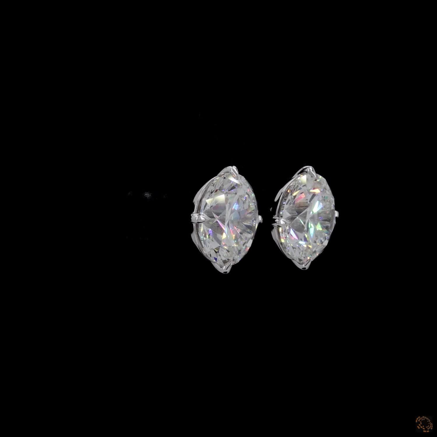 12.05 Ct Timeless single-stone solitaire design mounted in a sleek, architectural open-basket setting for optimal light entry