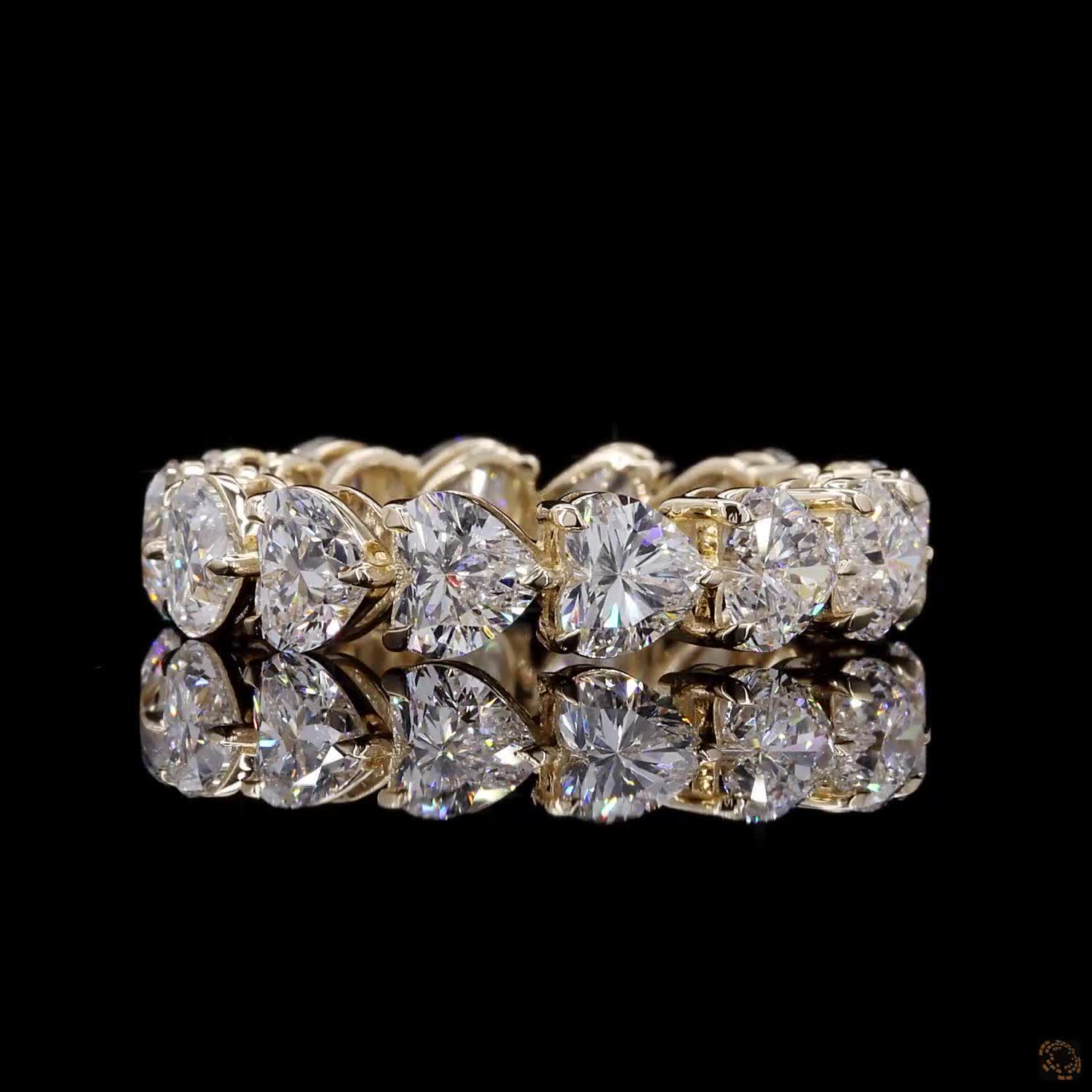 5.44 Ct Full eternity band featuring a continuous row of horizontally aligned east-west oriented heart-cut diamonds seamless set end-to-end around the entire band