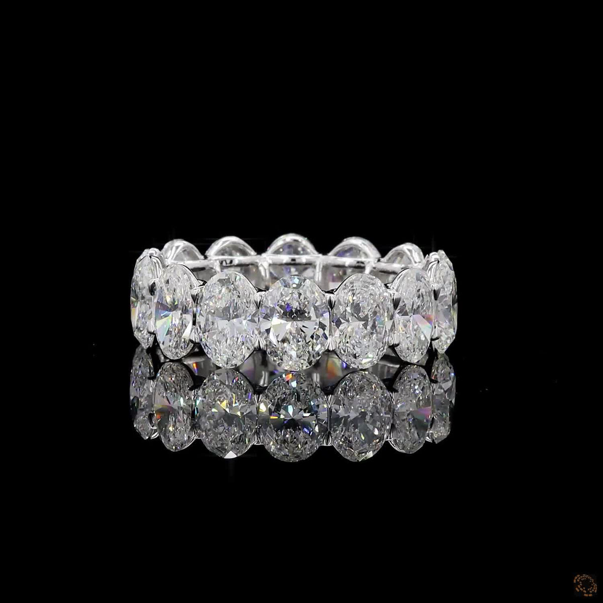 7.24 Ct Oval Cut Diamond Eternity Band set in white gold with vertically aligned oval stones