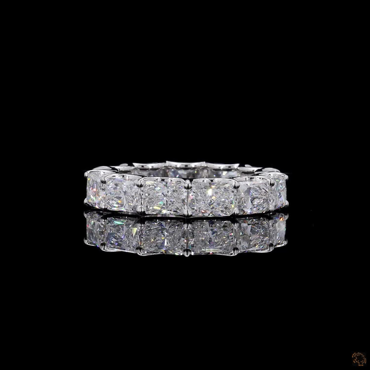 7.1 Ct East-West Radiant Cut Diamond Eternity Band set in white gold  with horizontally aligned stones and a scalloped open-gallery basket setting