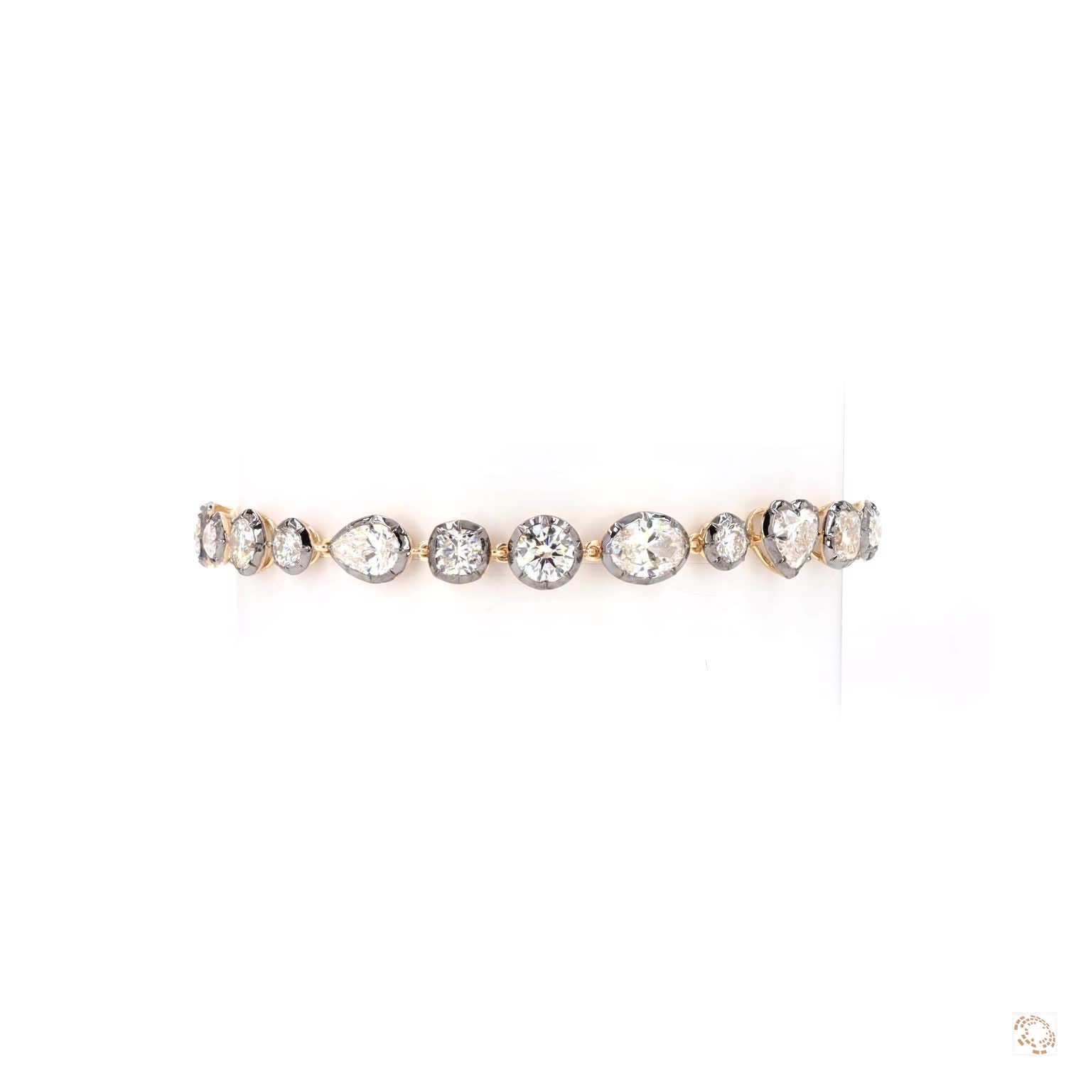 9.40 Ct Mixed fancy cuts including Heart Cut, Marquise, Oval, Pear, Cushion, and Round Brilliant diamonds