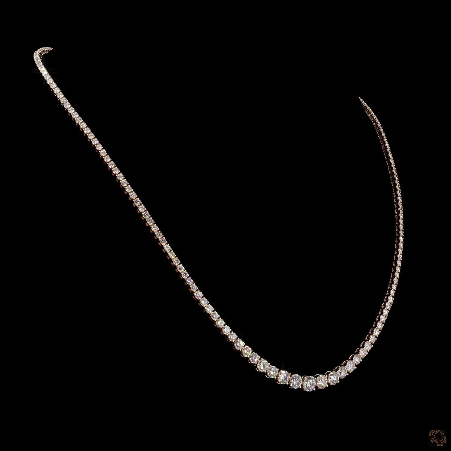 9.7 Ct Riviera-style tennis necklace featuring a smooth, symmetrical graduation of round brilliant diamonds leading to a central focal point