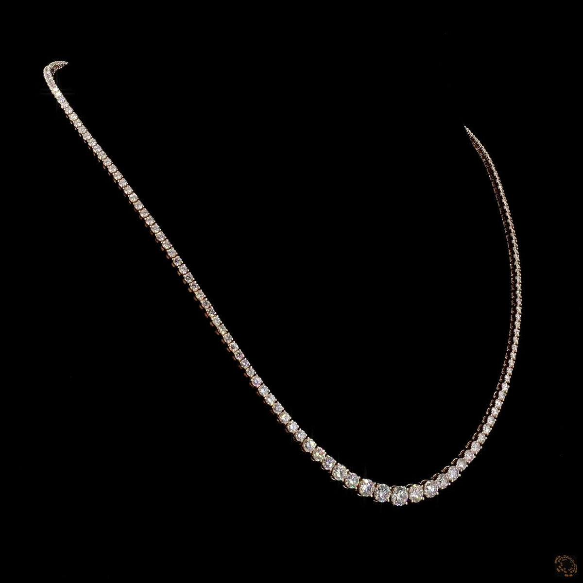 9.7 Ct Riviera-style tennis necklace featuring a smooth, symmetrical graduation of round brilliant diamonds