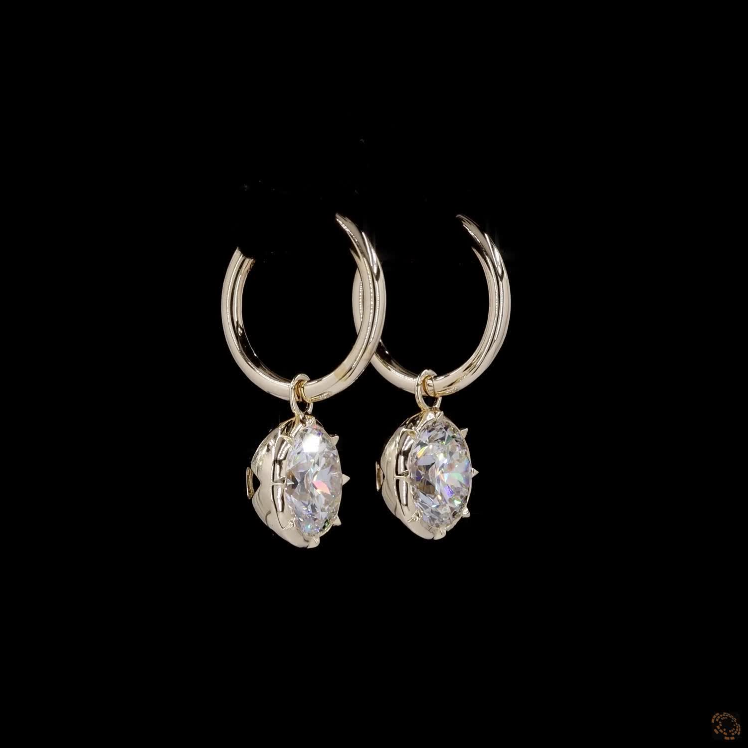 6.07 ct The full 14K yellow gold bezel frame warms the overall look, creating a rich aesthetic that elevates everyday diamond hoop stacks